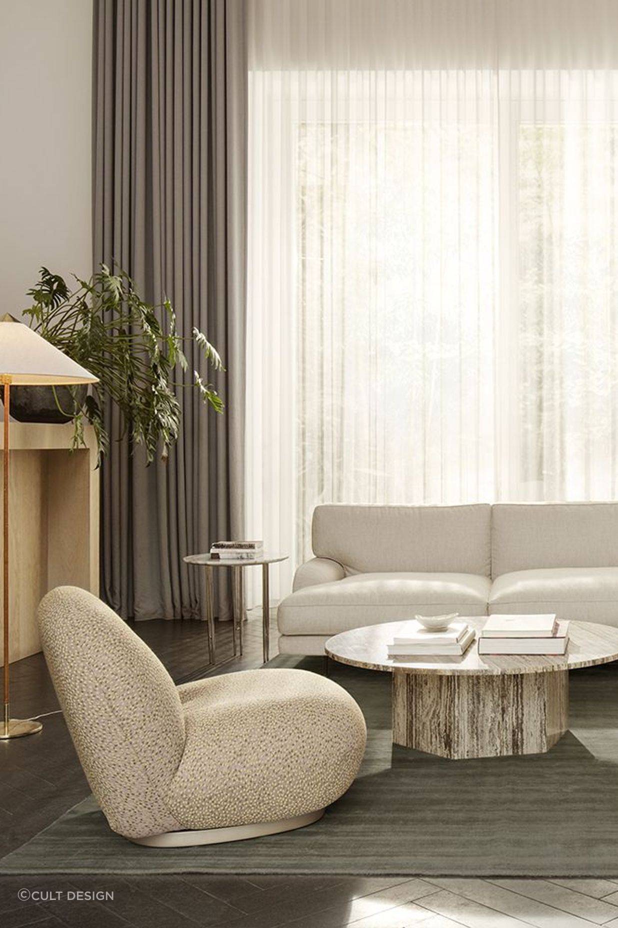 Round coffee tables soften a room, breaking the monotony of straight lines.
