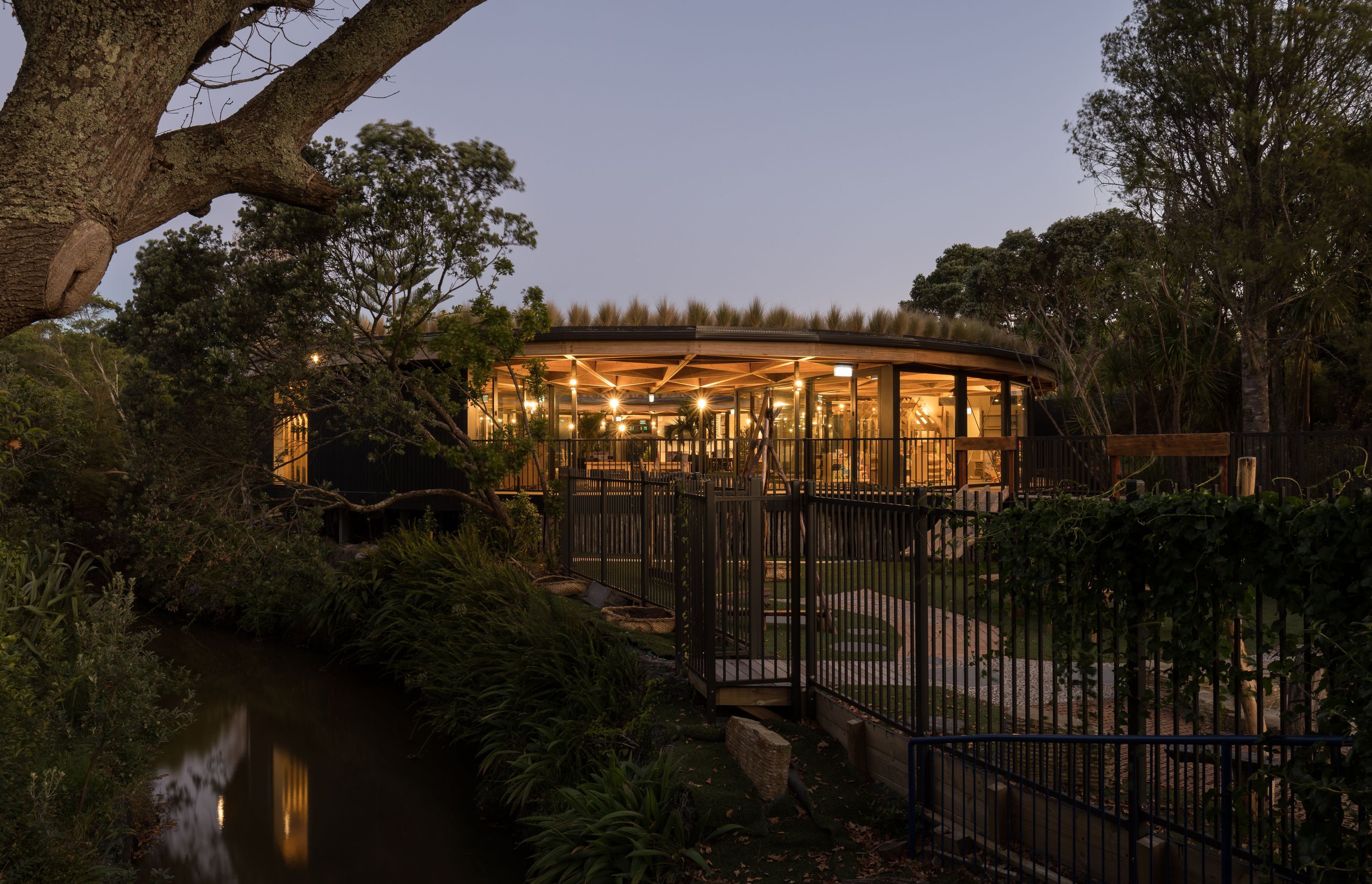 Kakapo Creek Children’s Garden in the evening, somewhat resembling a Japanese teahouse. | Photographer: Mark Scowen