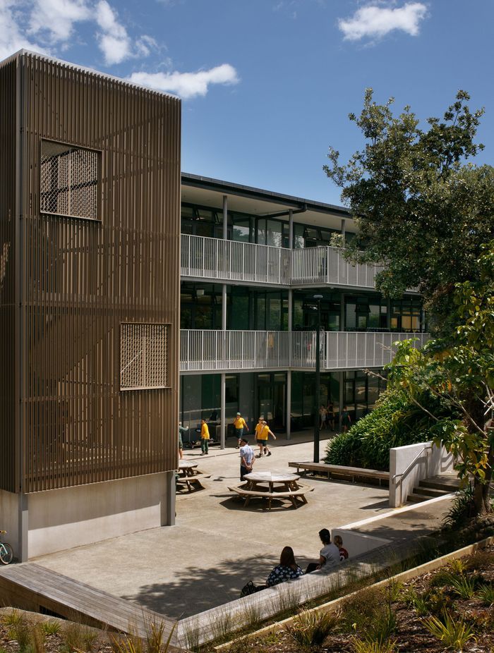 Custom UNEX stair enclosure and Hampton balustrades installed in a school setting