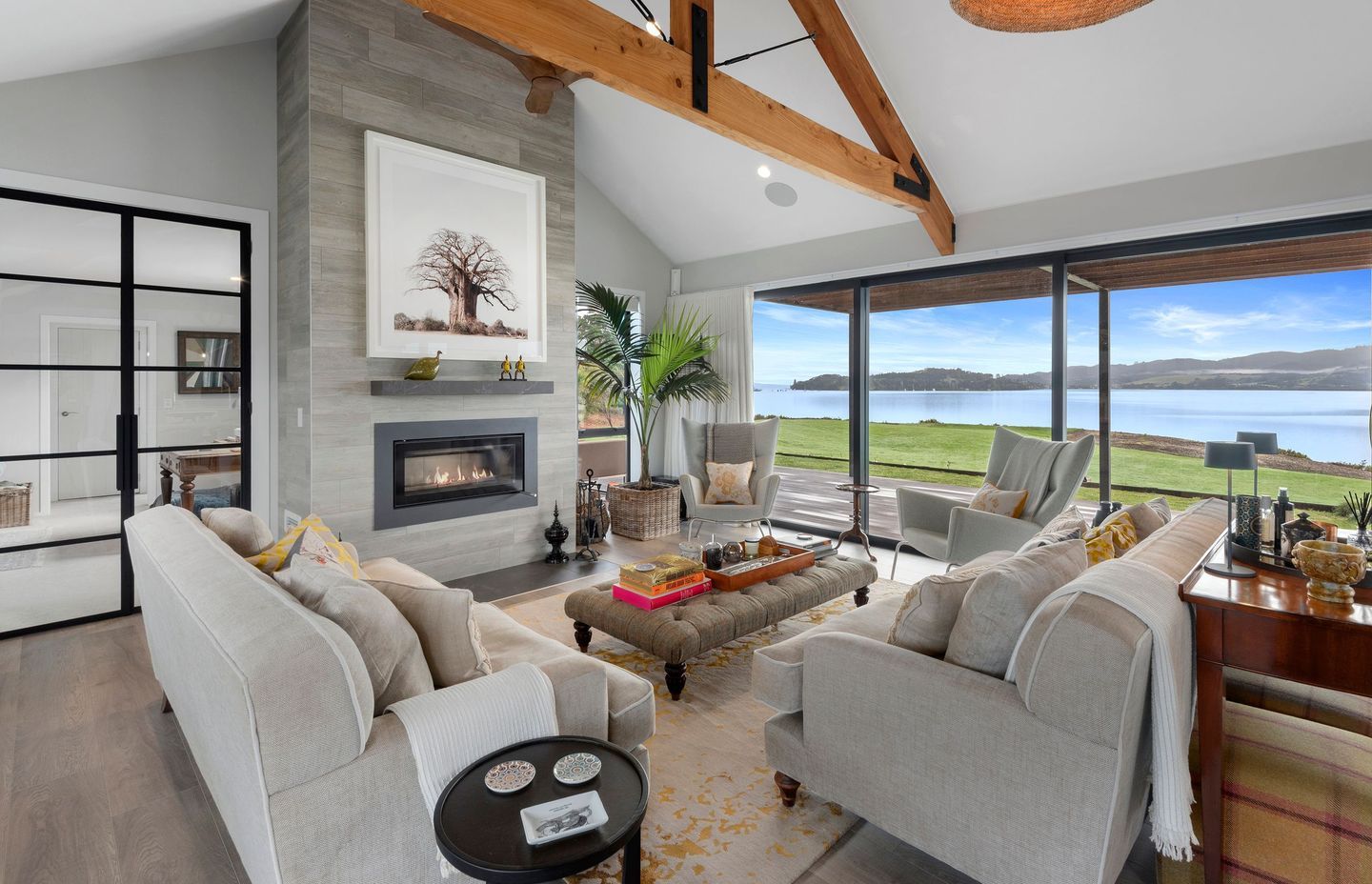 Macrocarpa trusses give the living space a rustic, farmhouse feel.