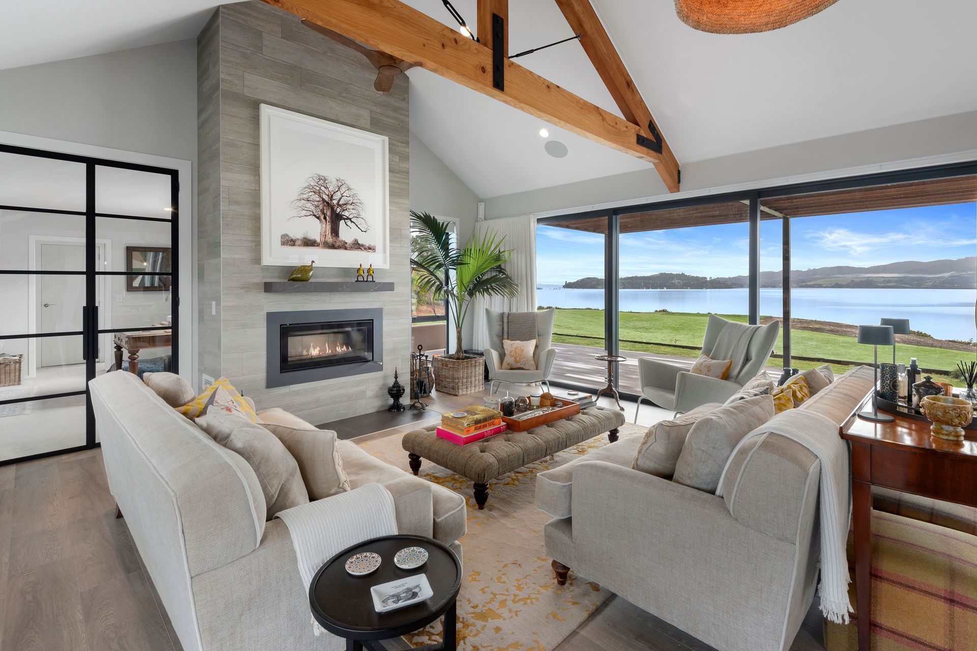 Macrocarpa trusses give the living space a rustic, farmhouse feel.