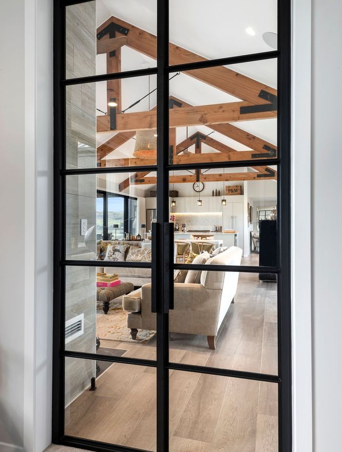 The Crittall door is a stand-out feature in the home, allowing line of sight whilst separating the bedrooms from the living area.