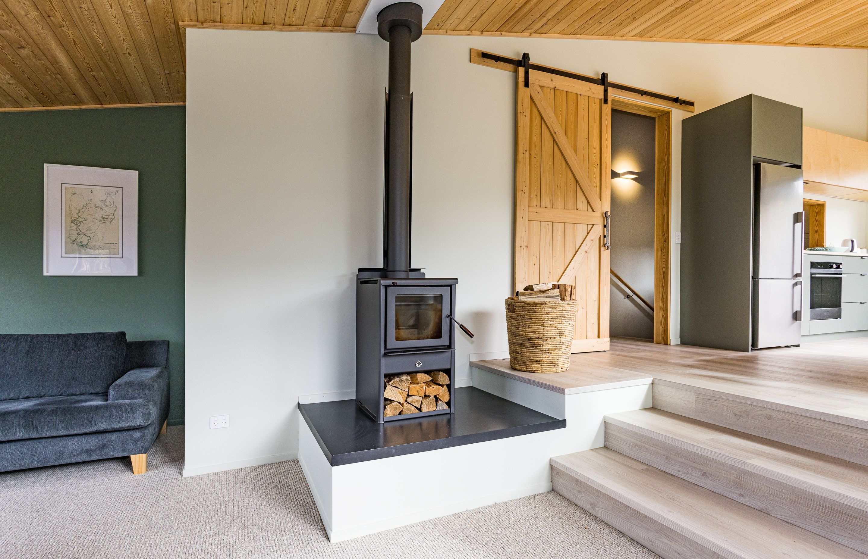 A wood burner adds ambience, and provides back-up heating.