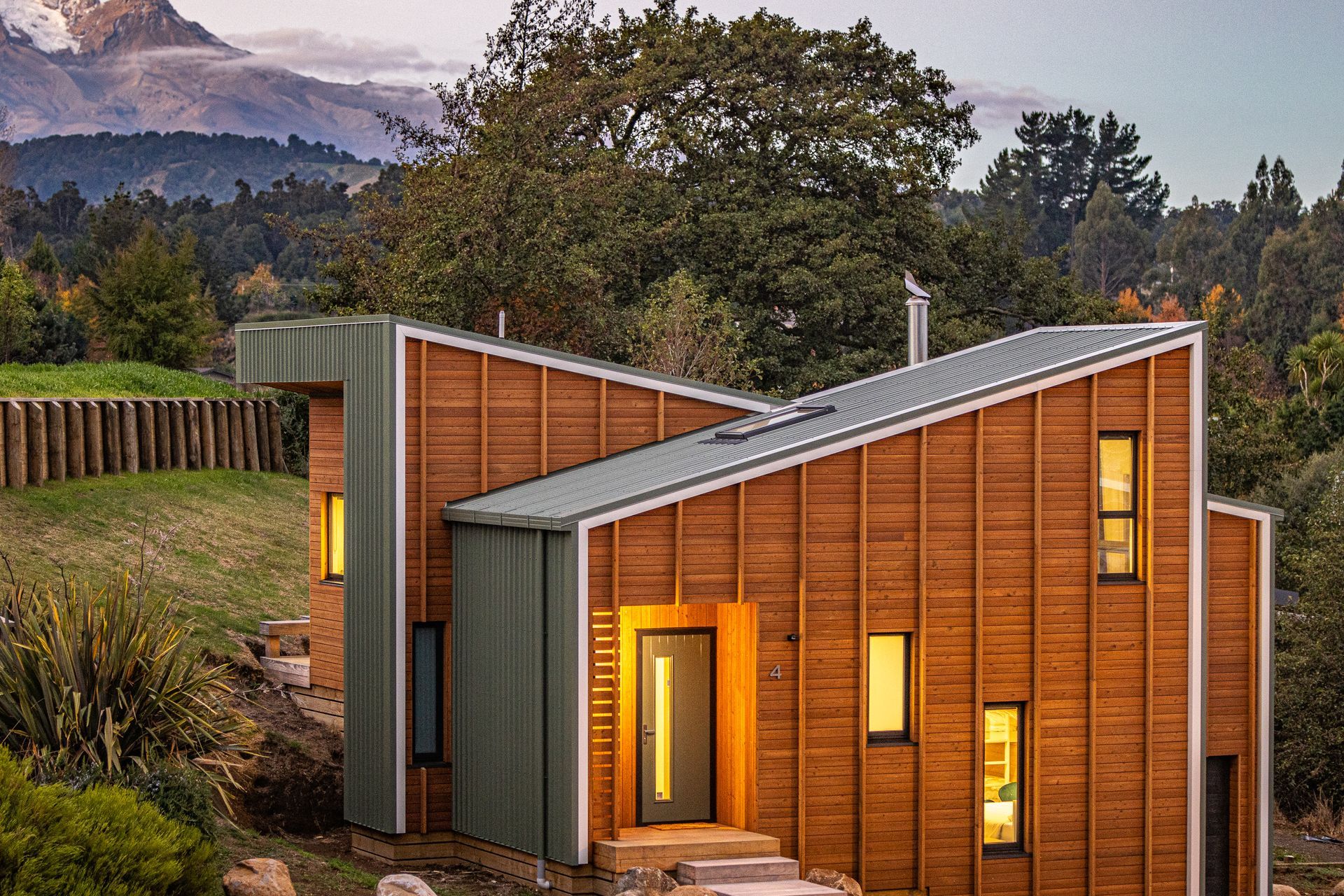 Two slices of the house, facing opposite directions, create the Twin Peaks.