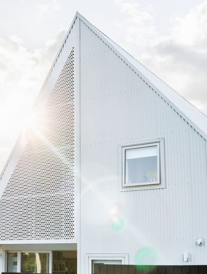 The paper house resembles a paper dart from the outside, and carefully folded origami on the interior.
