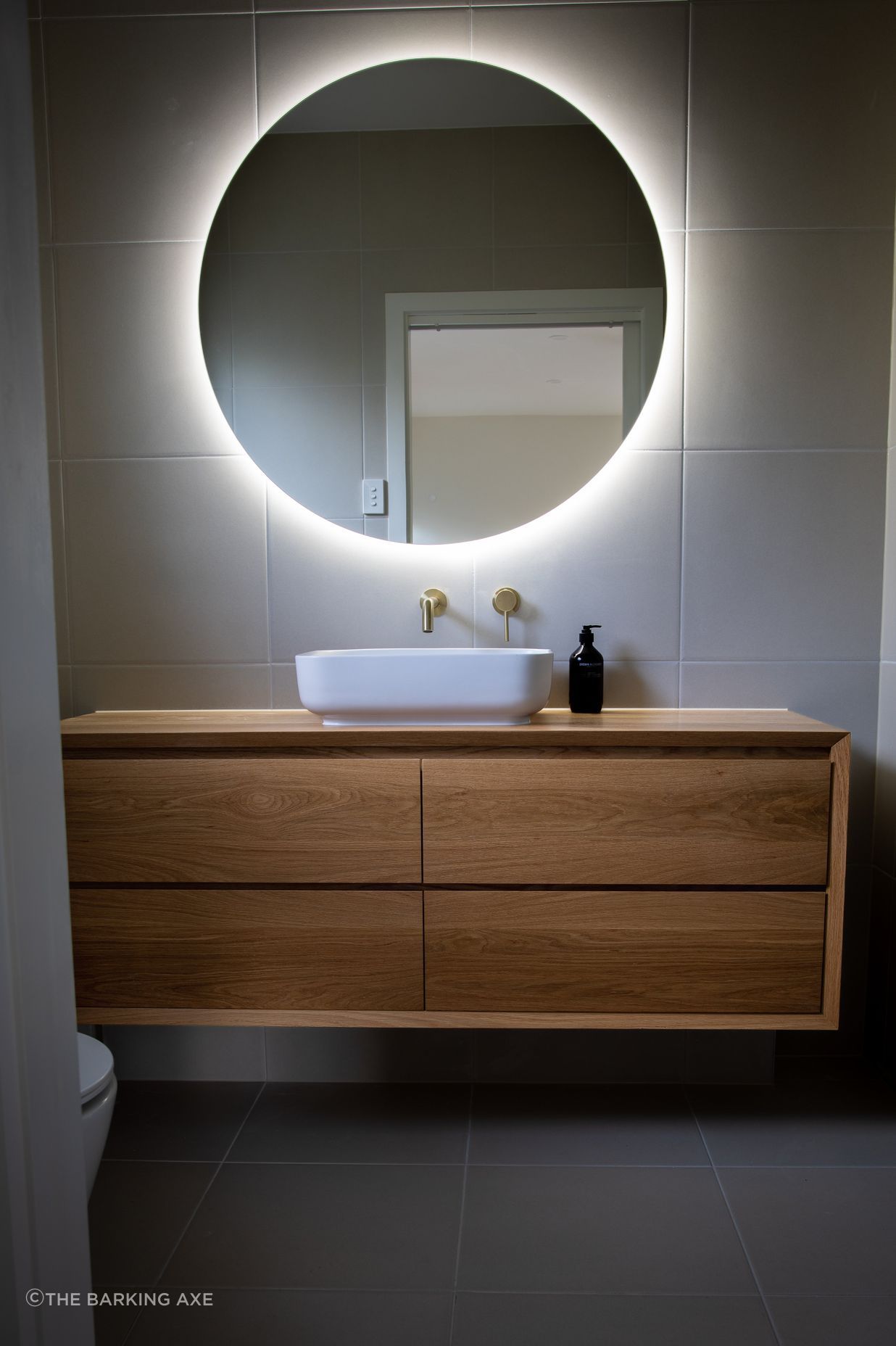 LED bathroom mirrors come in a variety of shapes and sizes. Featured project: American Oak Vanities