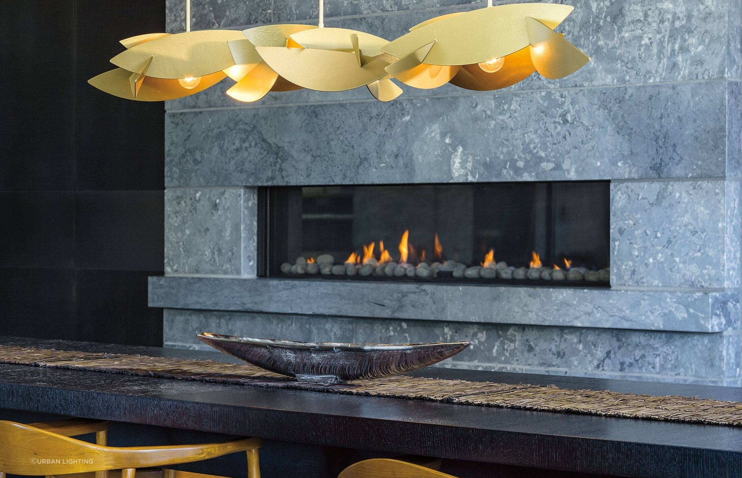 With the textured steel intersecting with the lights the Koi Collections creates a drama of light and shadow