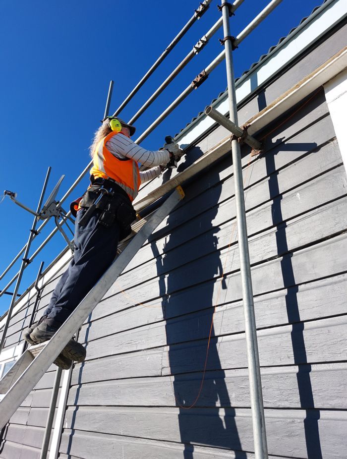 Jeffrey Dennison Builders mid-way through fascia board installation on a residential roofing project.