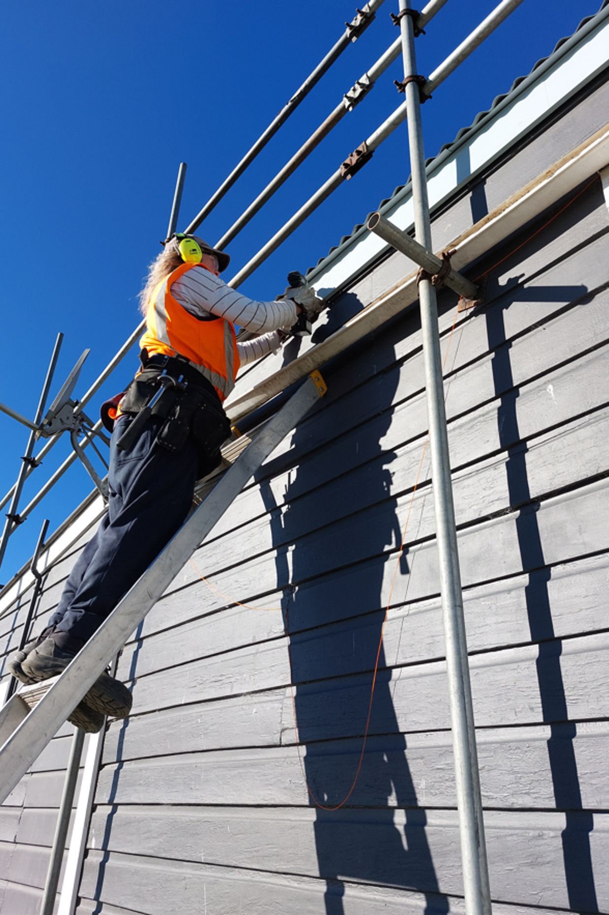 Jeffrey Dennison Builders mid-way through fascia board installation on a residential roofing project.