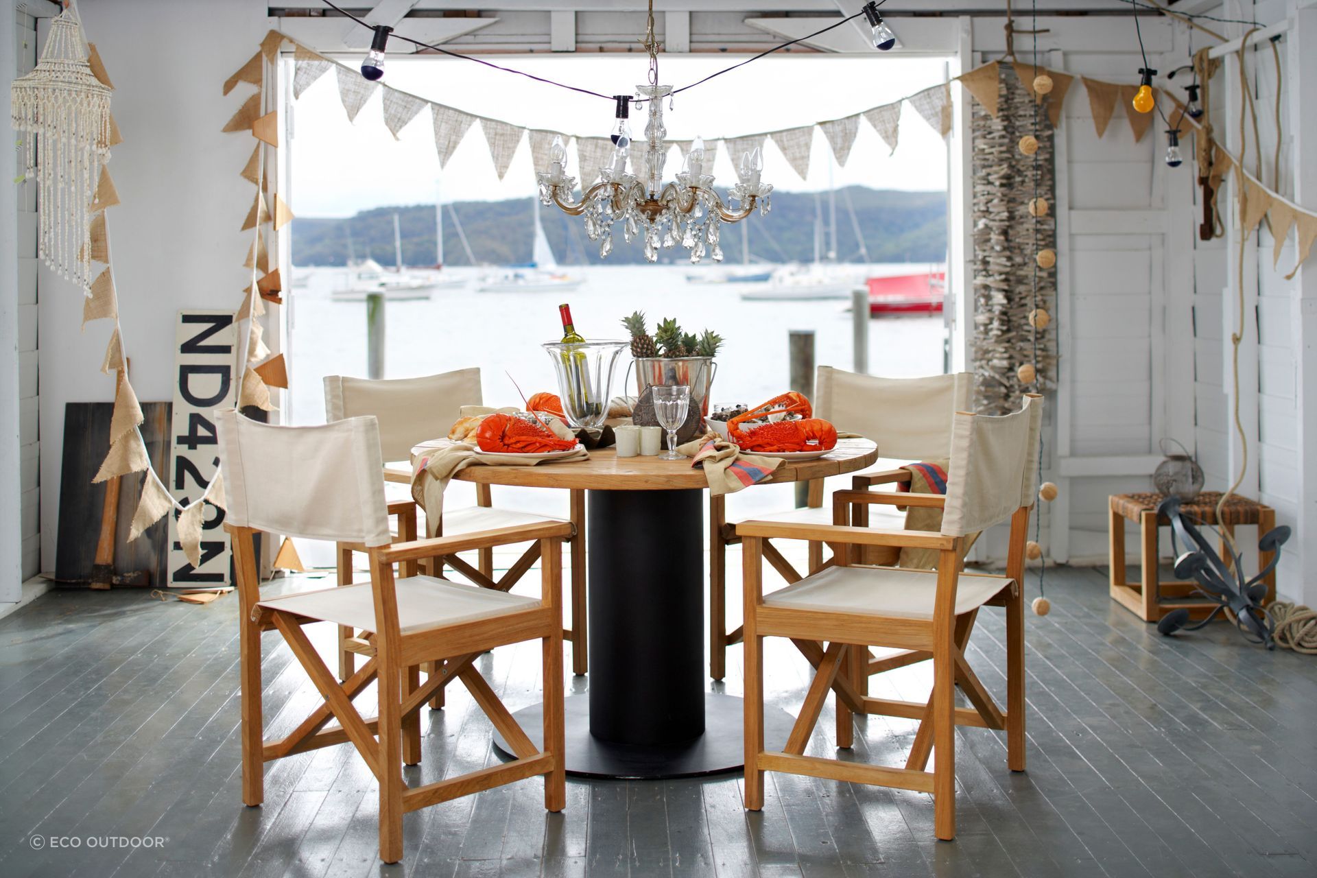 Tableware and matching styling on Mill Pedestal Outdoor Dining Table from Eco Outdoor