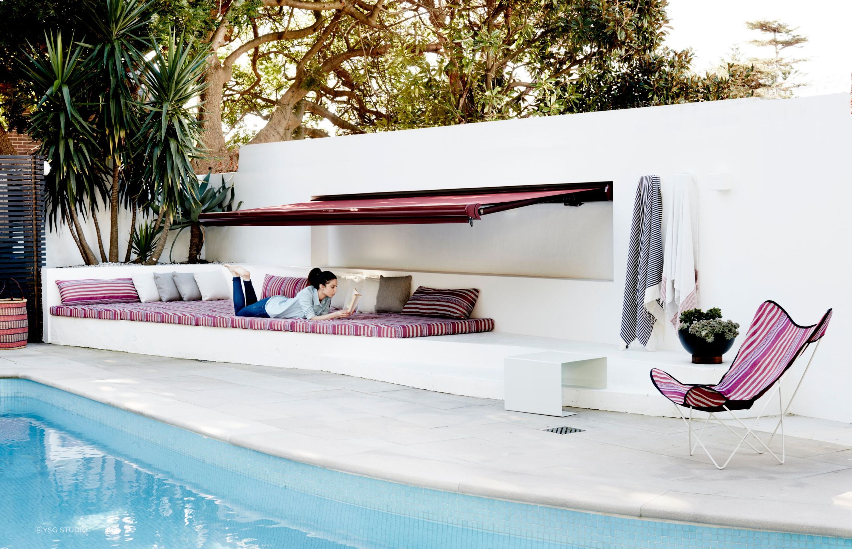 Inside Out House by YSG Studio | Photography by Prue Ruscoe - the right poolside area can give you plenty of extra living space.
