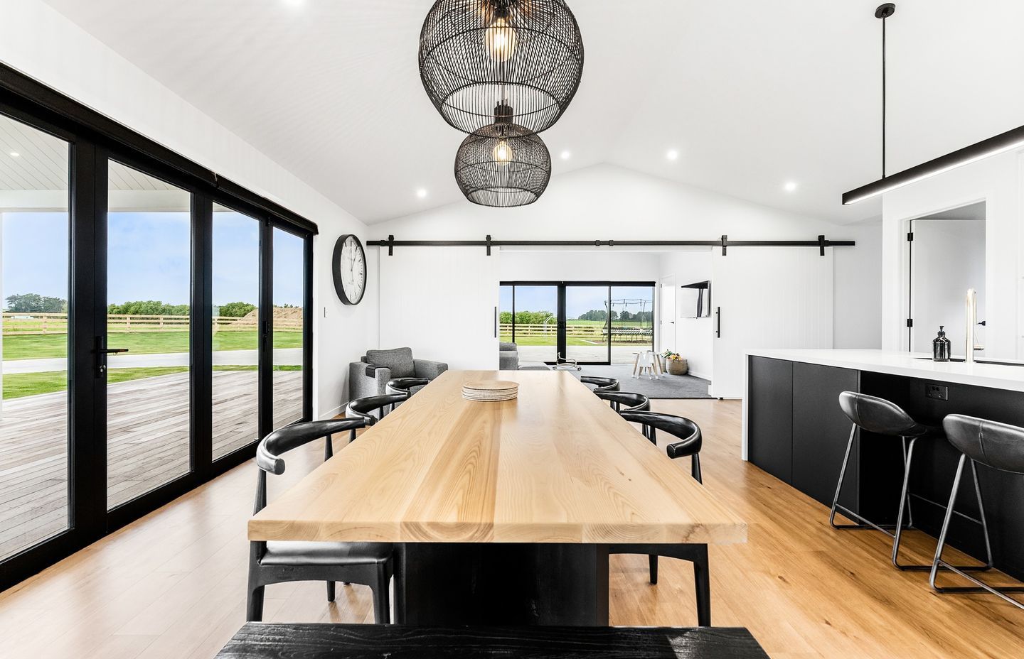 Alyssa choose a set of AR41 barn doors with black tracks and hardware to close off the wide entrance to the second living/playroom.