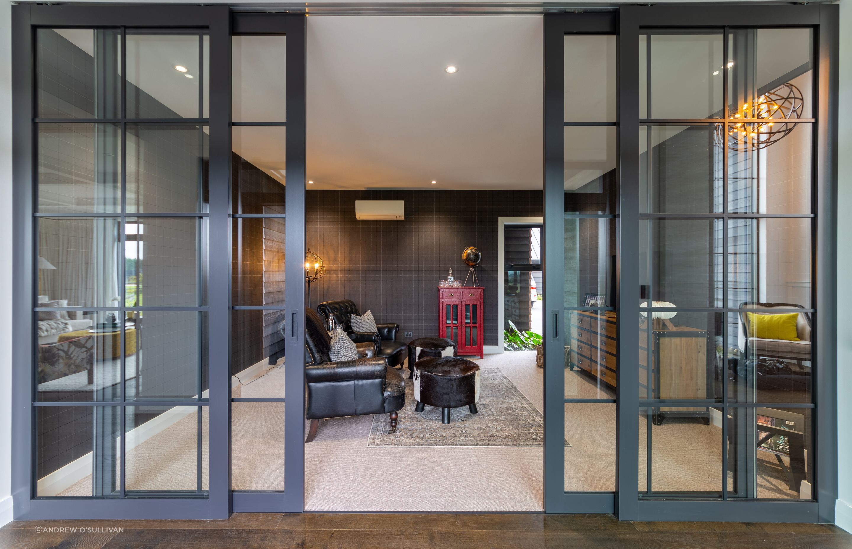 Chamlang are members of the Resene EcoDecorator family. Resene Half Alabaster in various sheen levels was used throughout the interior of this large home.