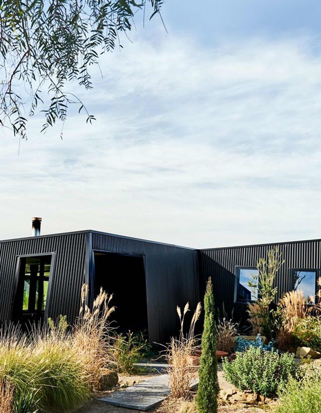 Eco-Friendly Hillside Retreat x Sculpt Fireplace Collection