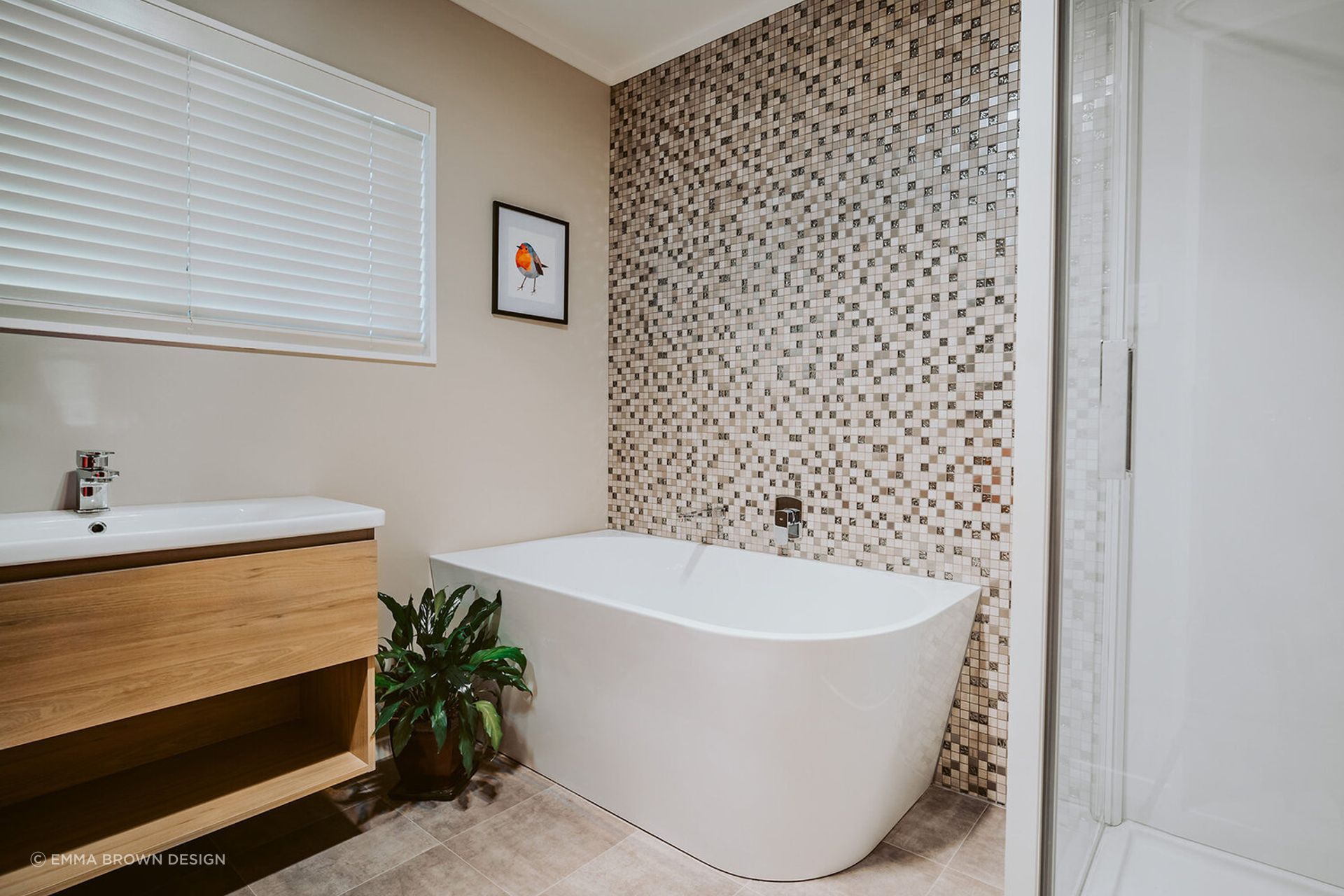 A nice mosaic accent wall makes the perfect option for a bathtub surround in Fitzherbert Avenue.
