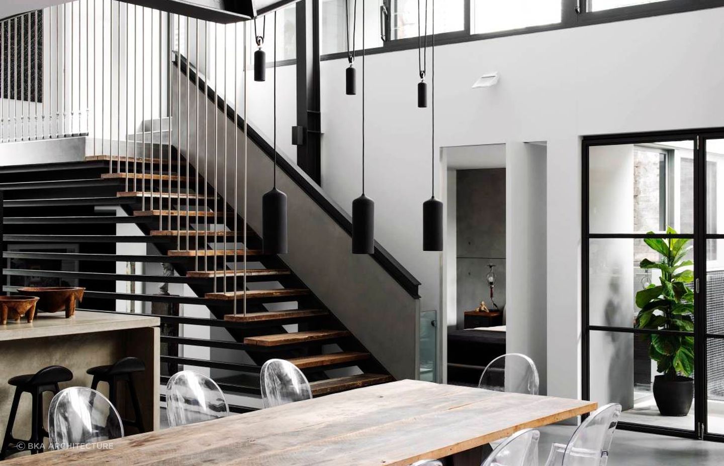 A great example of industrial style lighting in the living space of this Paddington warehouse conversion