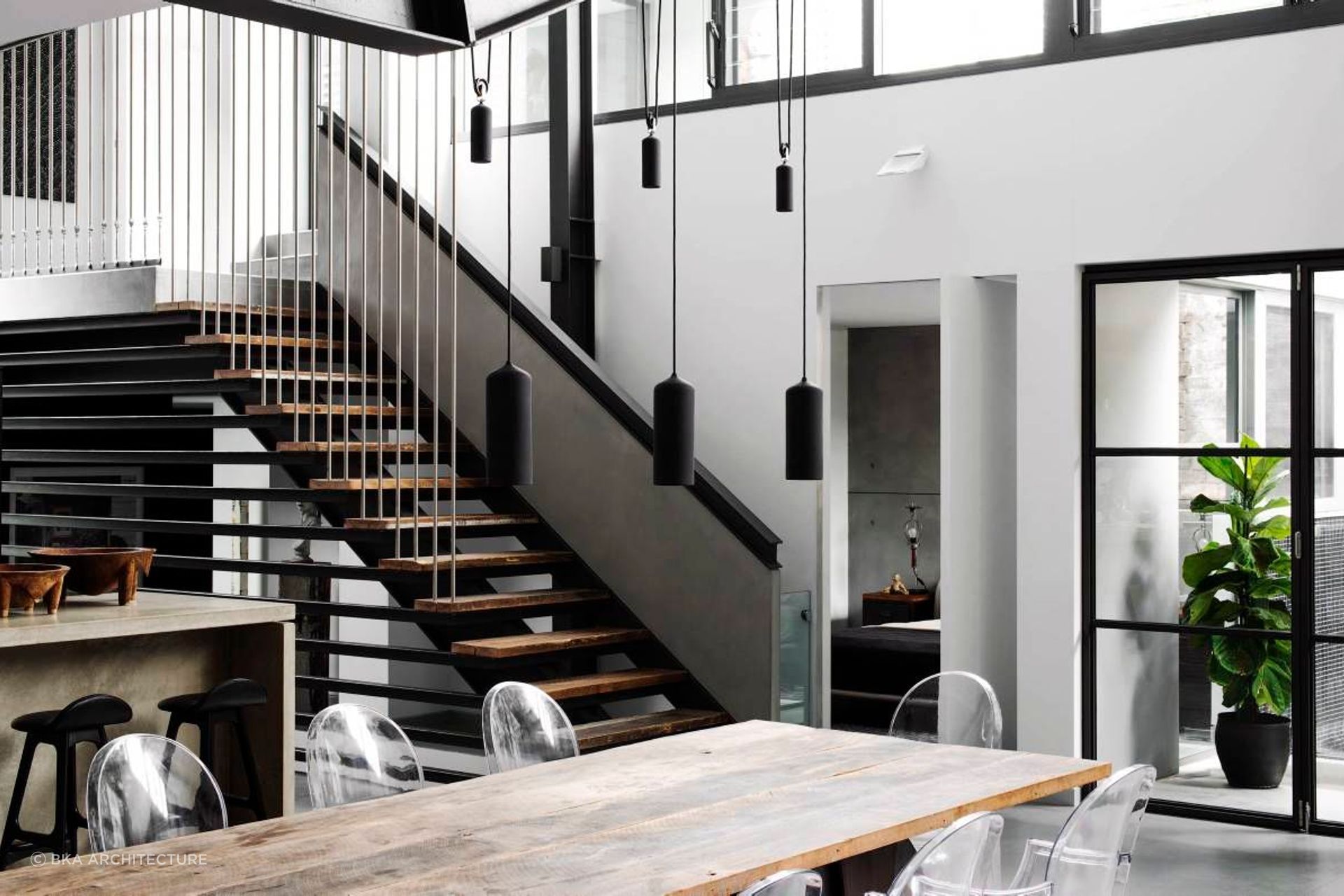 A great example of industrial style lighting in the living space of this Paddington warehouse conversion