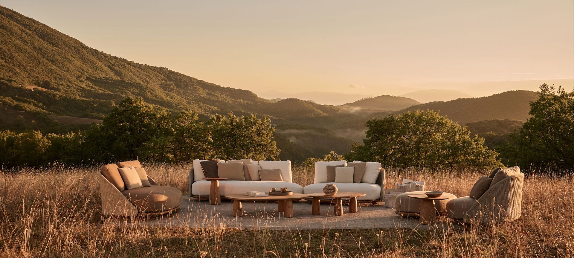 Elio seating by Yabu Pushelberg with Dunes low tables and Gobi basket.