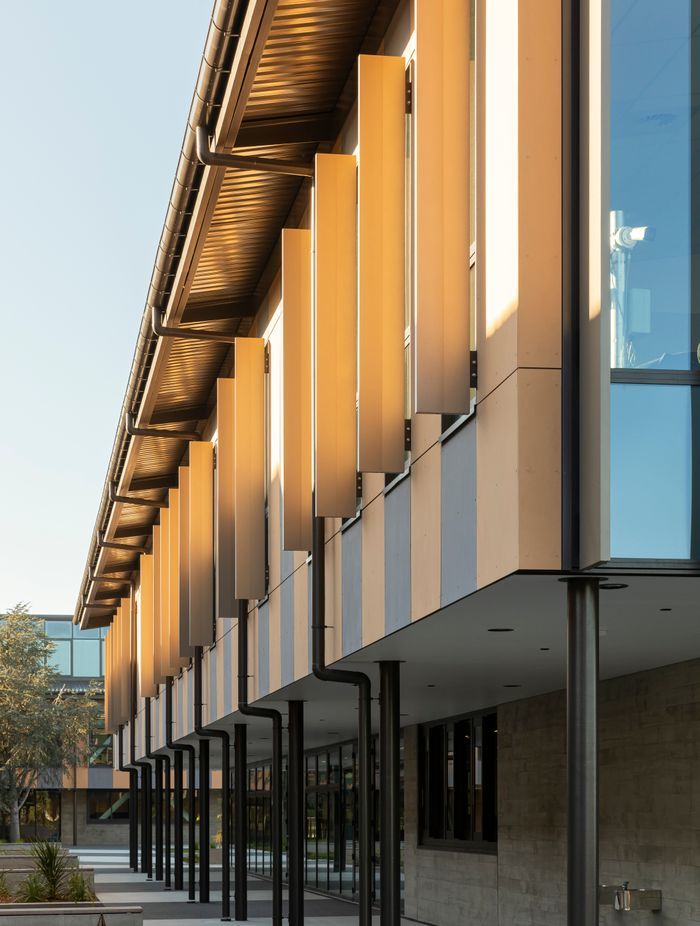 The exterior Symonite panelling supplied by The Building Agency features the multiple different hues of the Port Hills in the background.