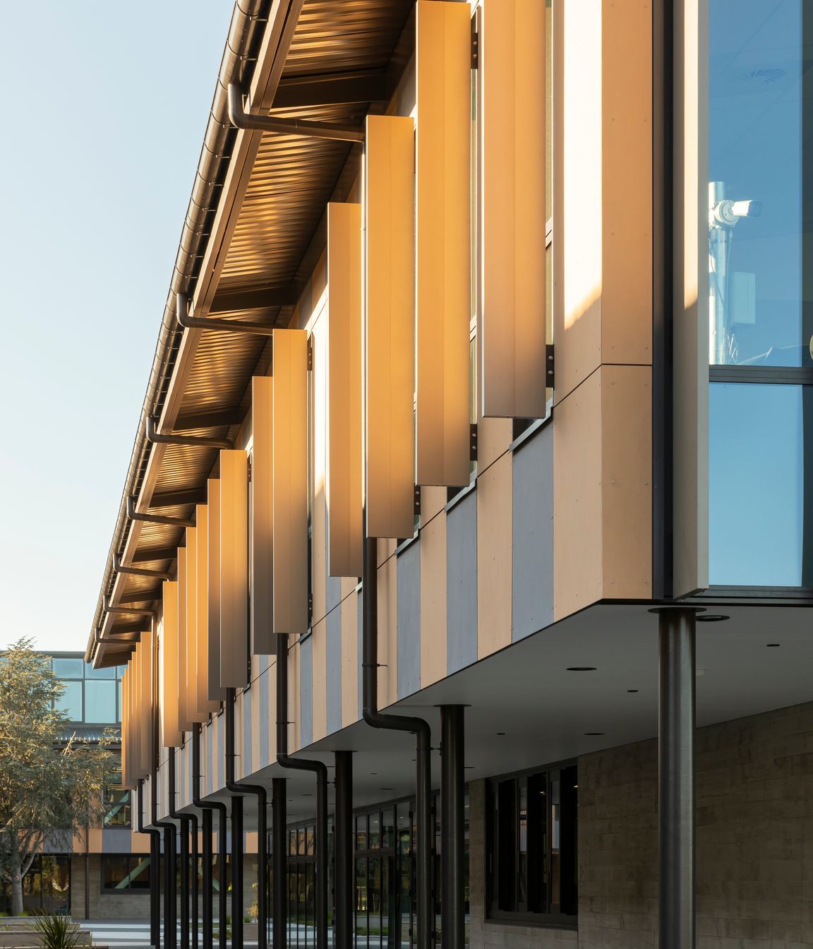 The exterior Symonite panelling supplied by The Building Agency features the multiple different hues of the Port Hills in the background.