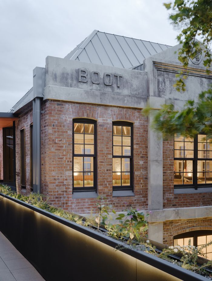 External brick façade retained in Boot Factory restoration while ASH's mass timber was used throughout the internal structural restoration. Image: Hamish McIntosh