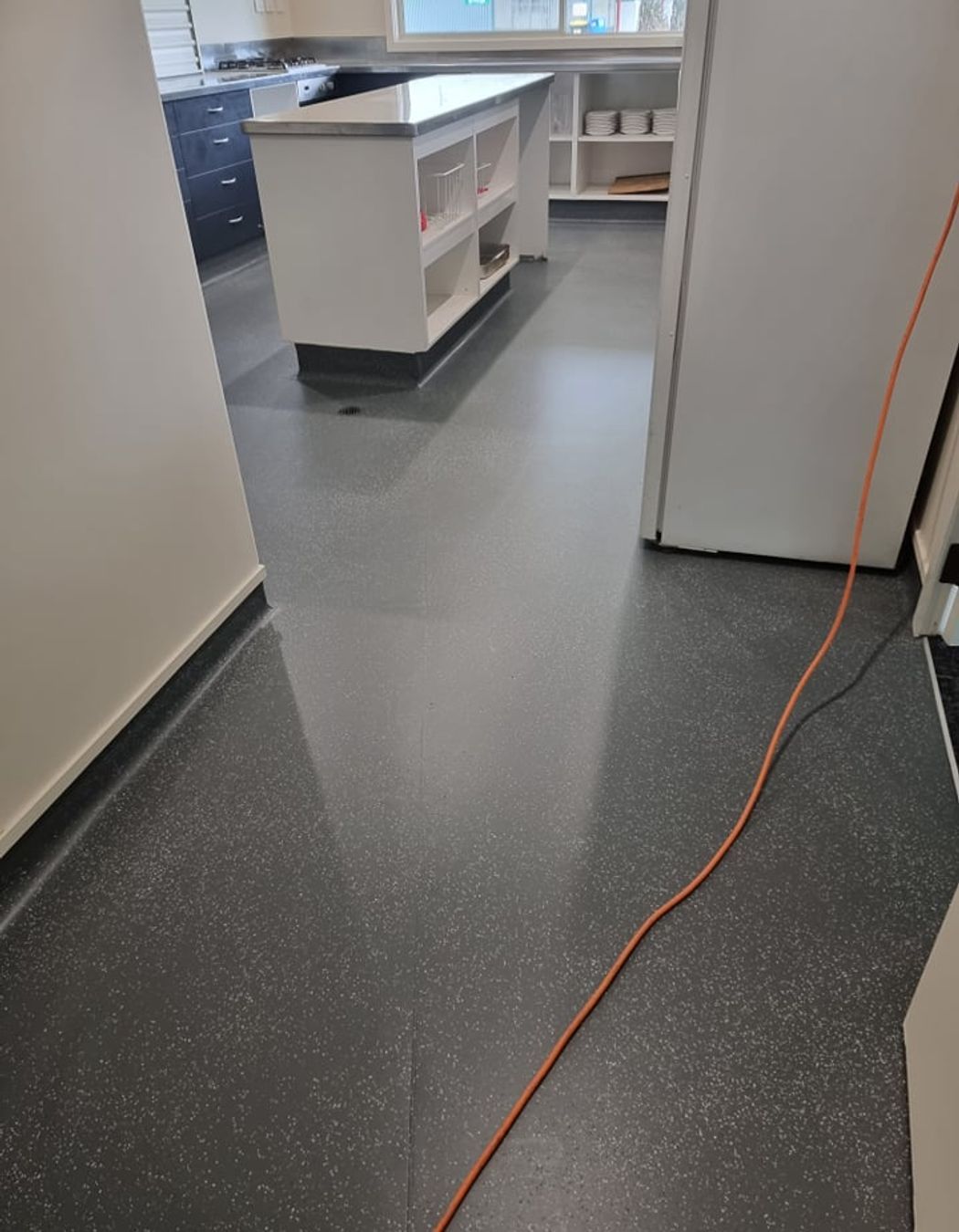 In this commercial kitchen space, a refreshed floor colour with Bona Resilient coating update the space, extending the life of the vinyl for years to come.