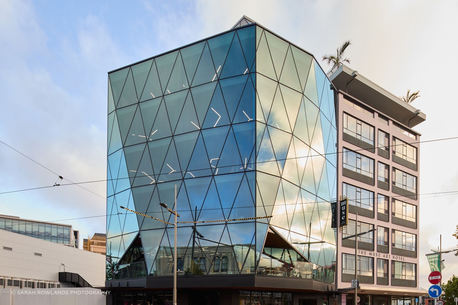 200 High Street, Christchurch - the glazed façade delivers a refined aesthetic; its faceted form and the seismic demands of the site increased complexity requiring a well-considered engineered solution.