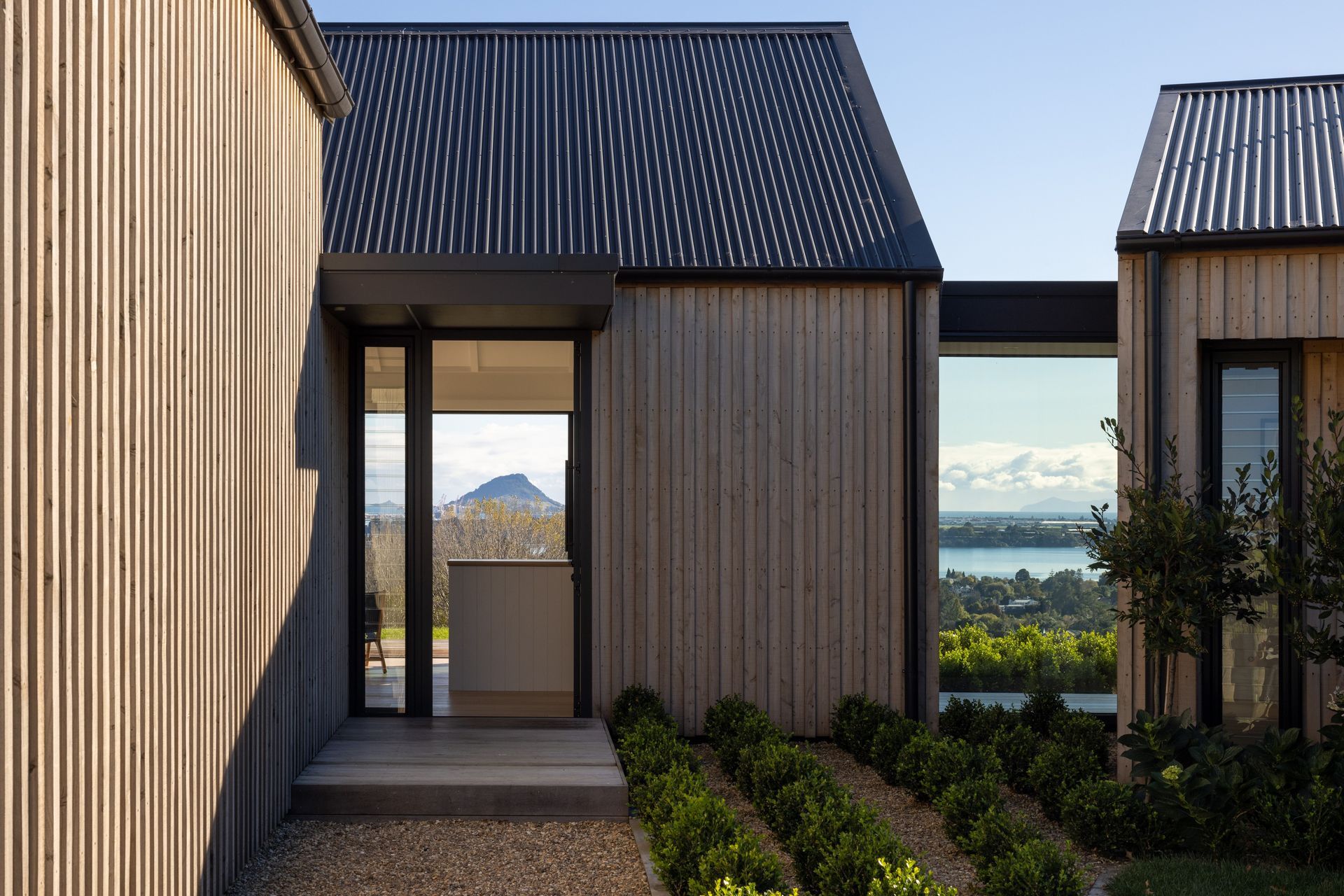 Guests to this home in Welcome Bay are greeted to the spectacular view of Mt Maunganui as soon as the front door opens - Photography: Simon Devitt