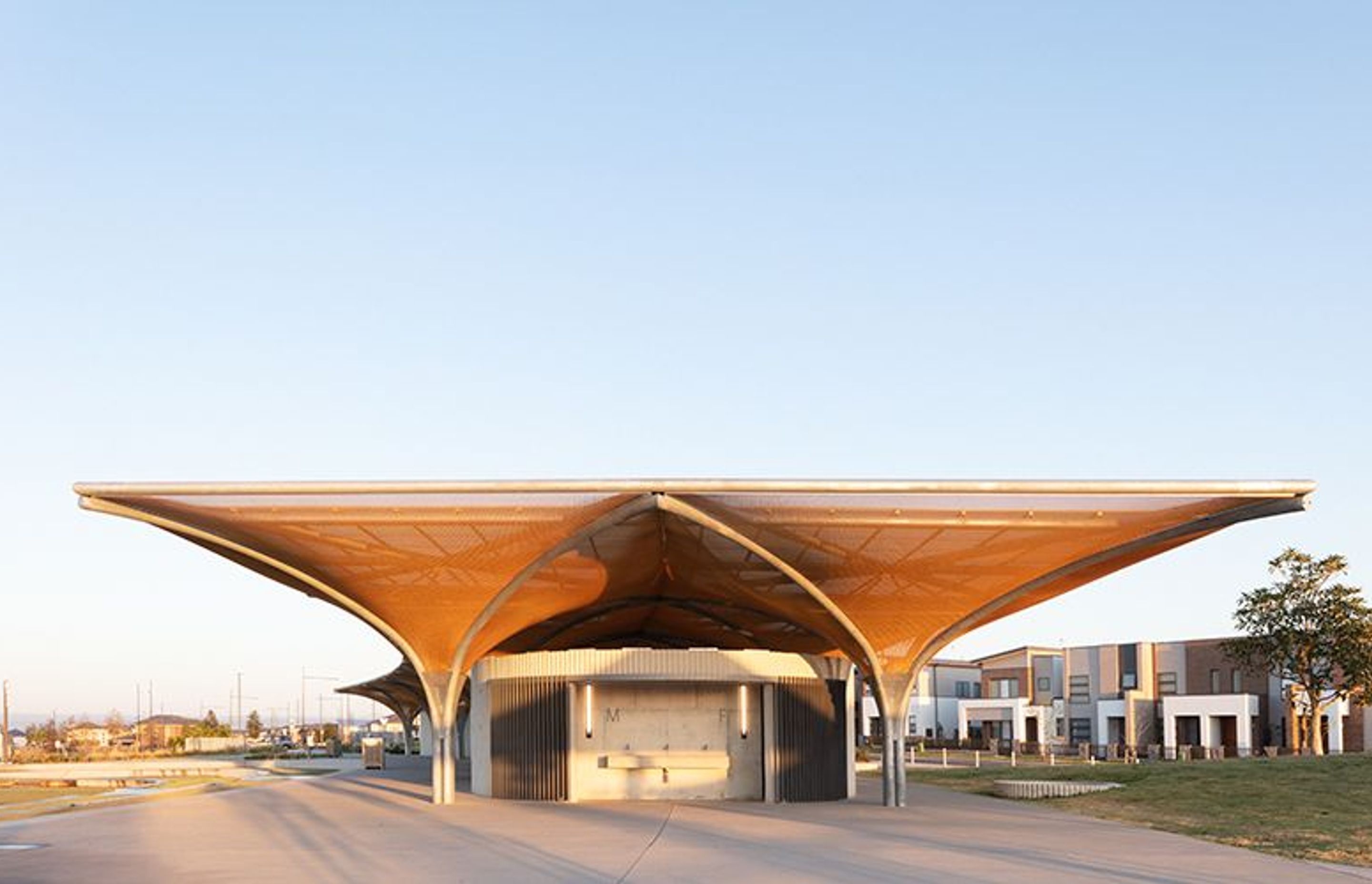 Golden Mesh Shades a Sports Pavilion in Sydney