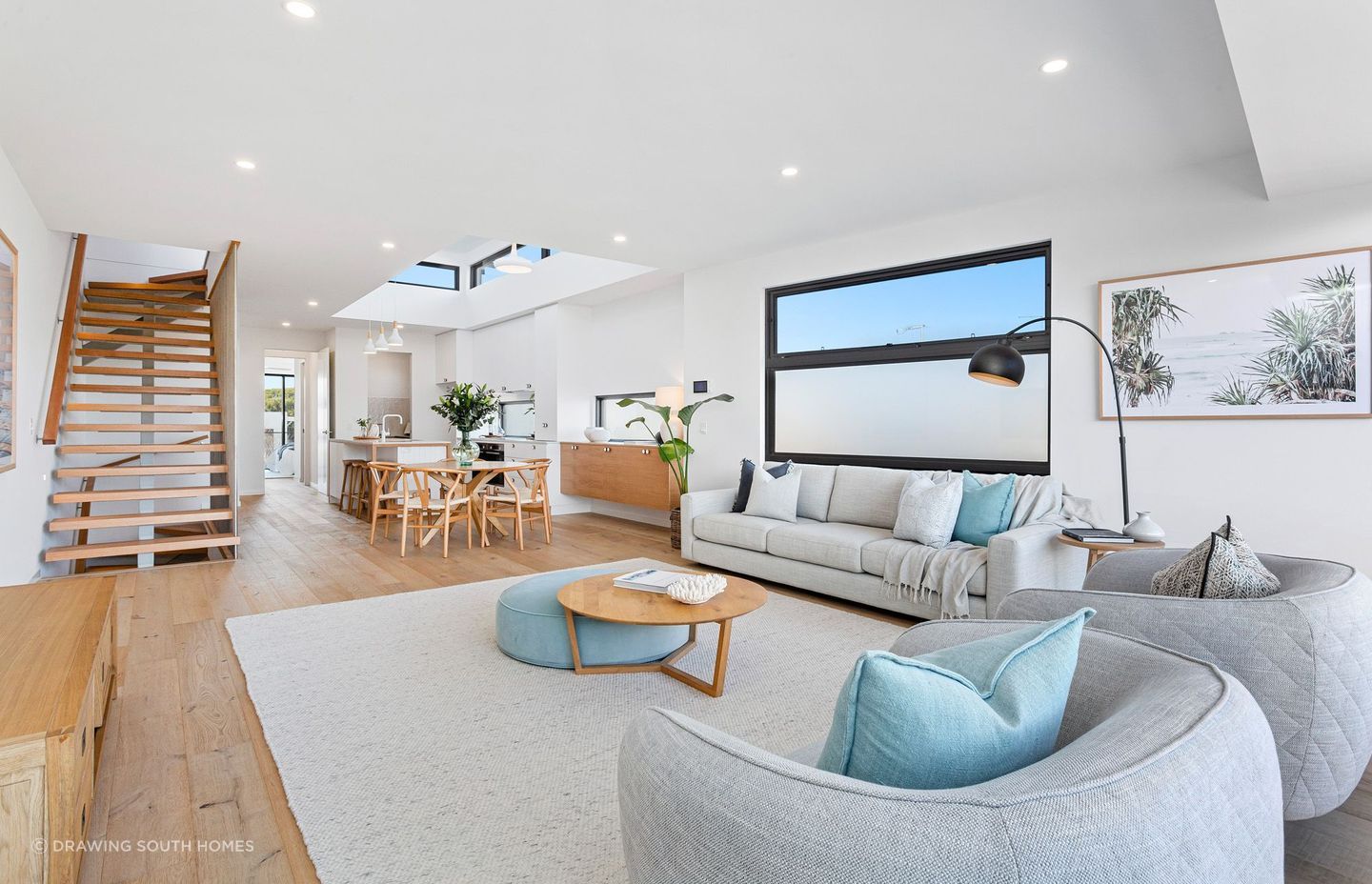 The living rooms in these Mornington townhouses offer expansive open spaces.