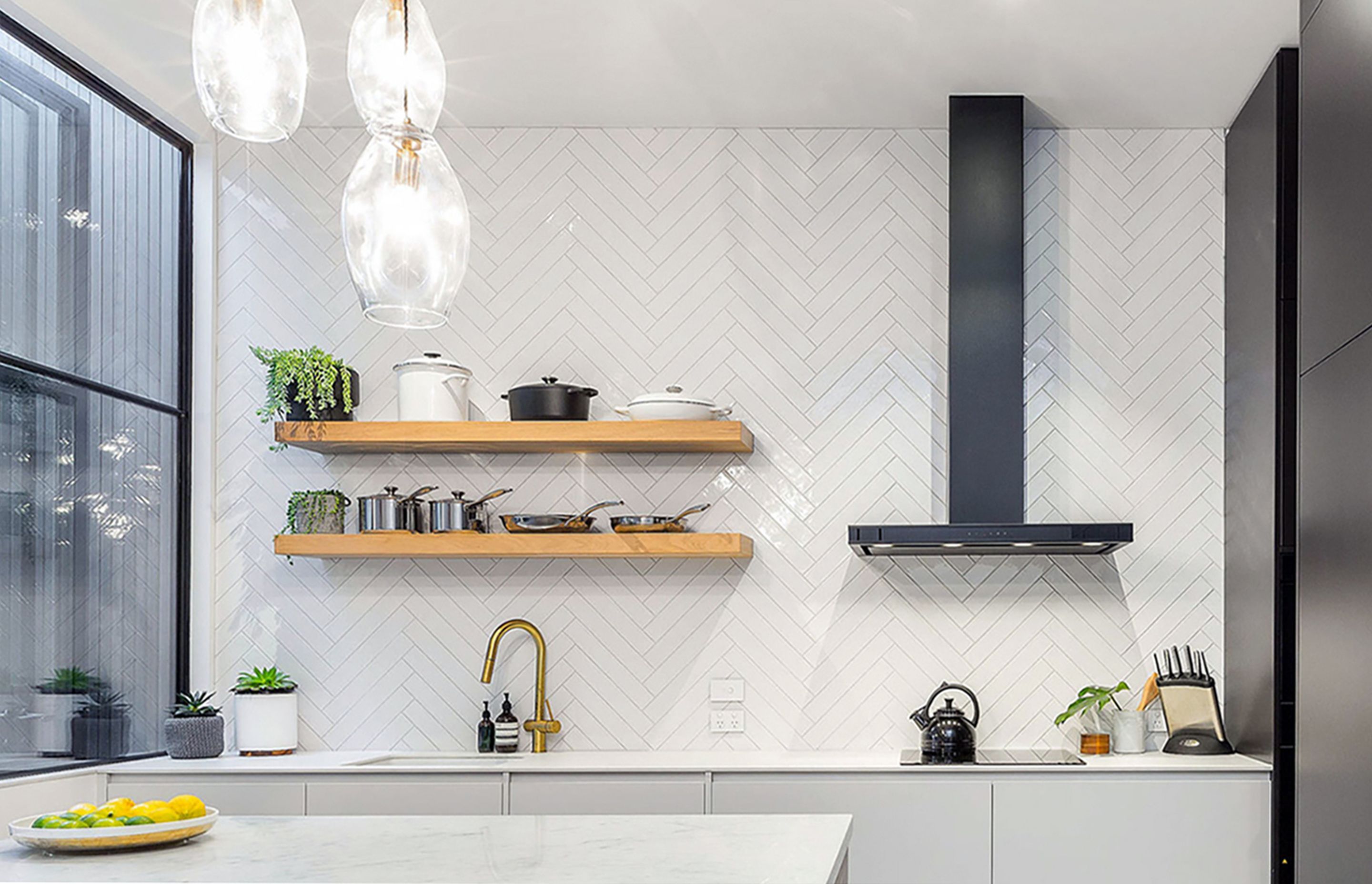 © First Avenue Homes - featuring Schweigen DS3326B-9S 900mm Silent Wallmount Rangehood