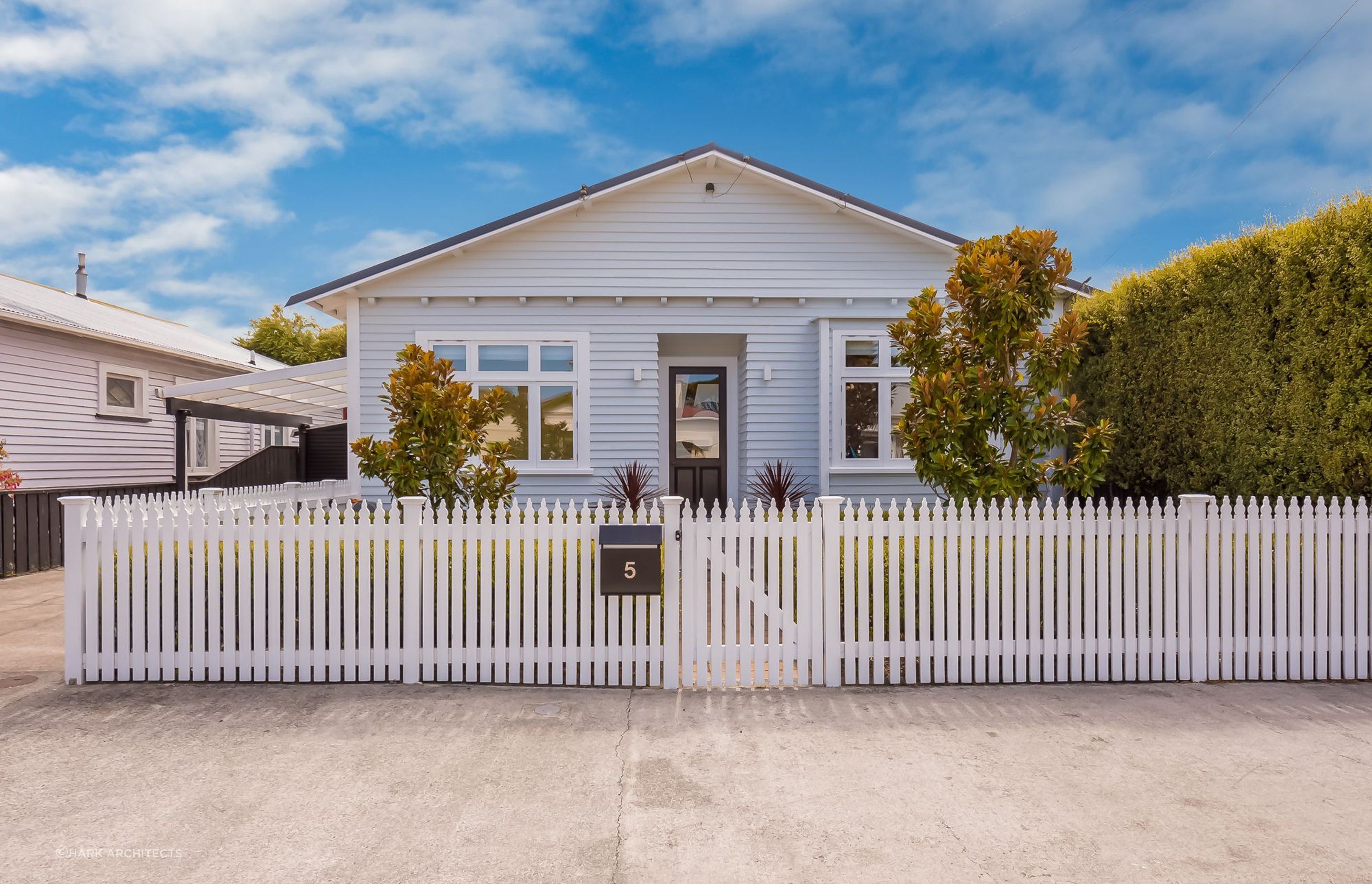 There's no shortage of great ideas for how to design your front door like this numbered approach for this cottage in Petone - Photography: Wendy Powell
