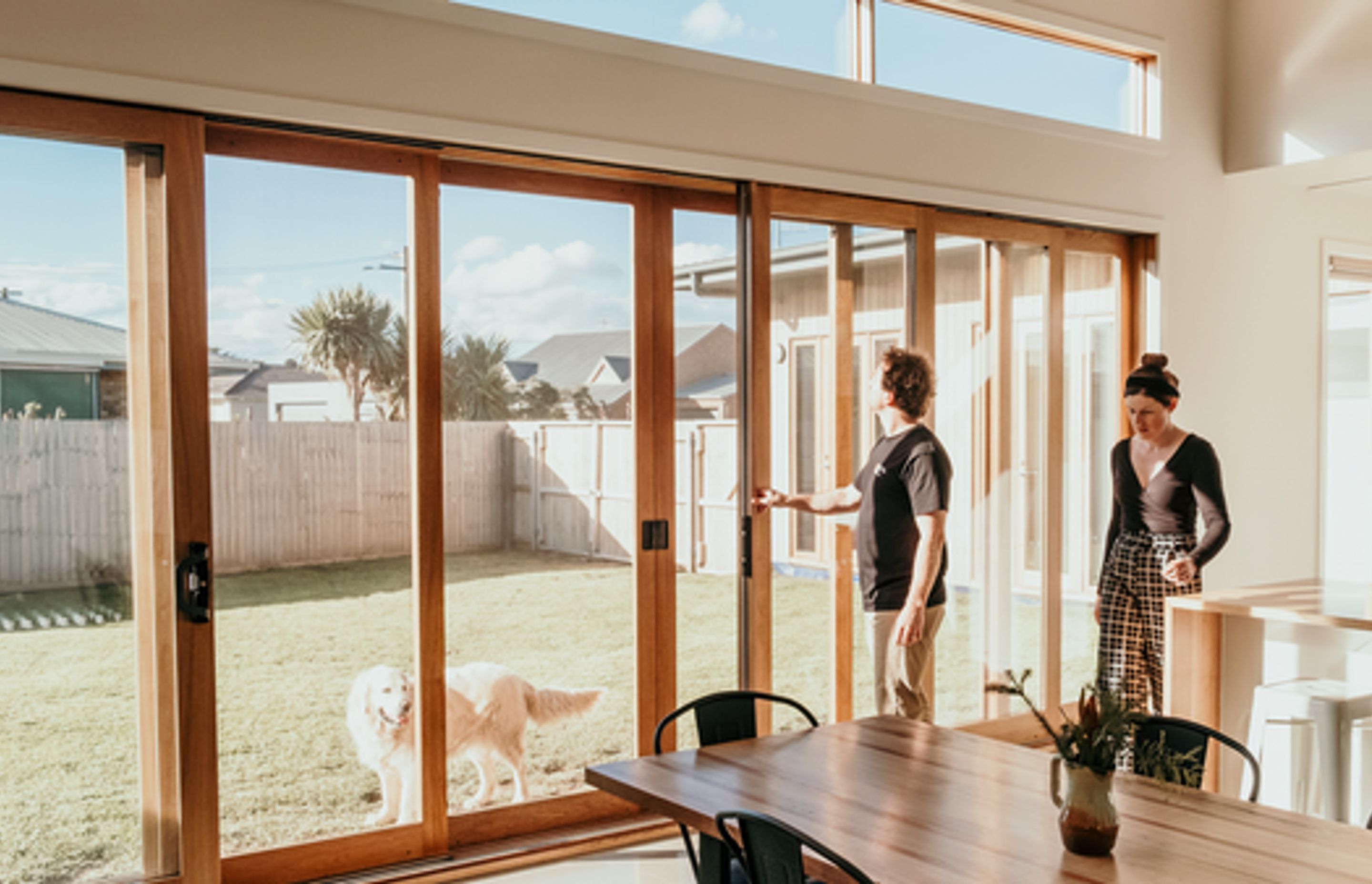 Image: The L Shape House features large north facing double glazed windows which captures plenty of natural light.