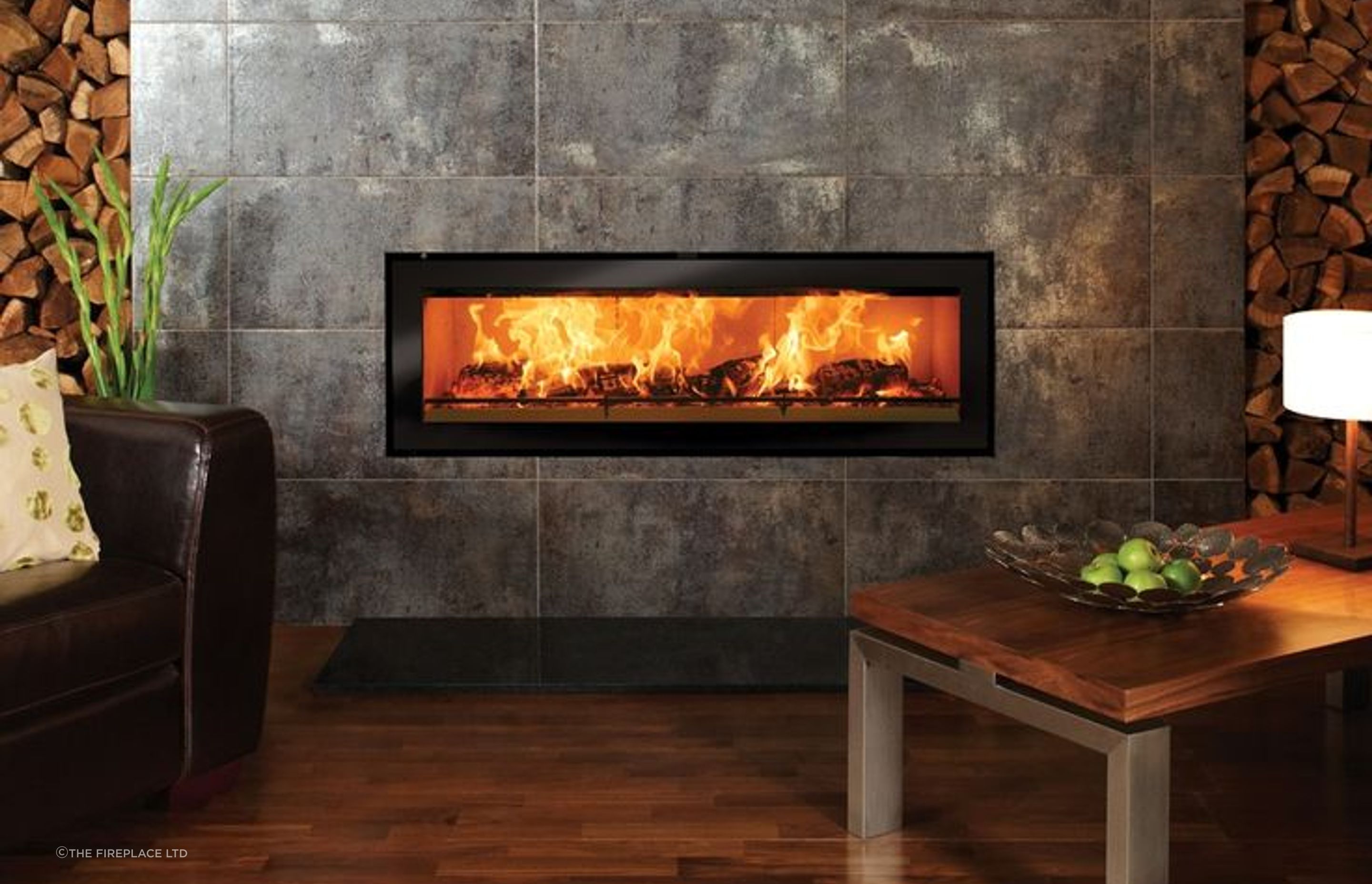 The Studio 3 provides a panoramic view of the shimmering flames and glowing logs.