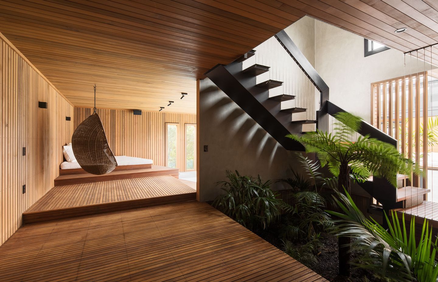 Heavily clad in cedar, and connected to the internal garden, the well-being zone exhibits a calming sense of nature.