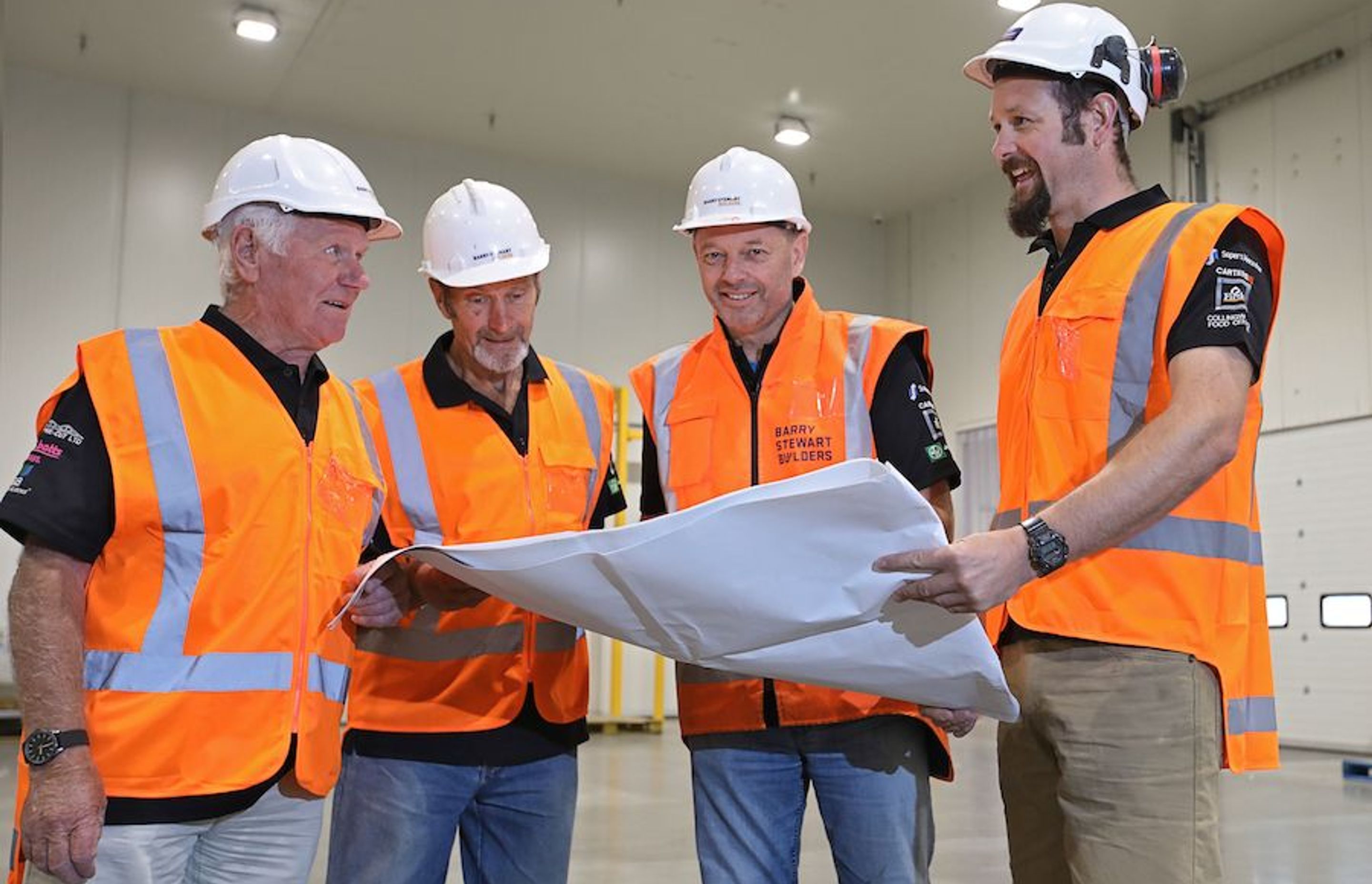 Barry Stewart (second from right) and the team inspecting the completed Bidfood Distribution Centre in 2017

