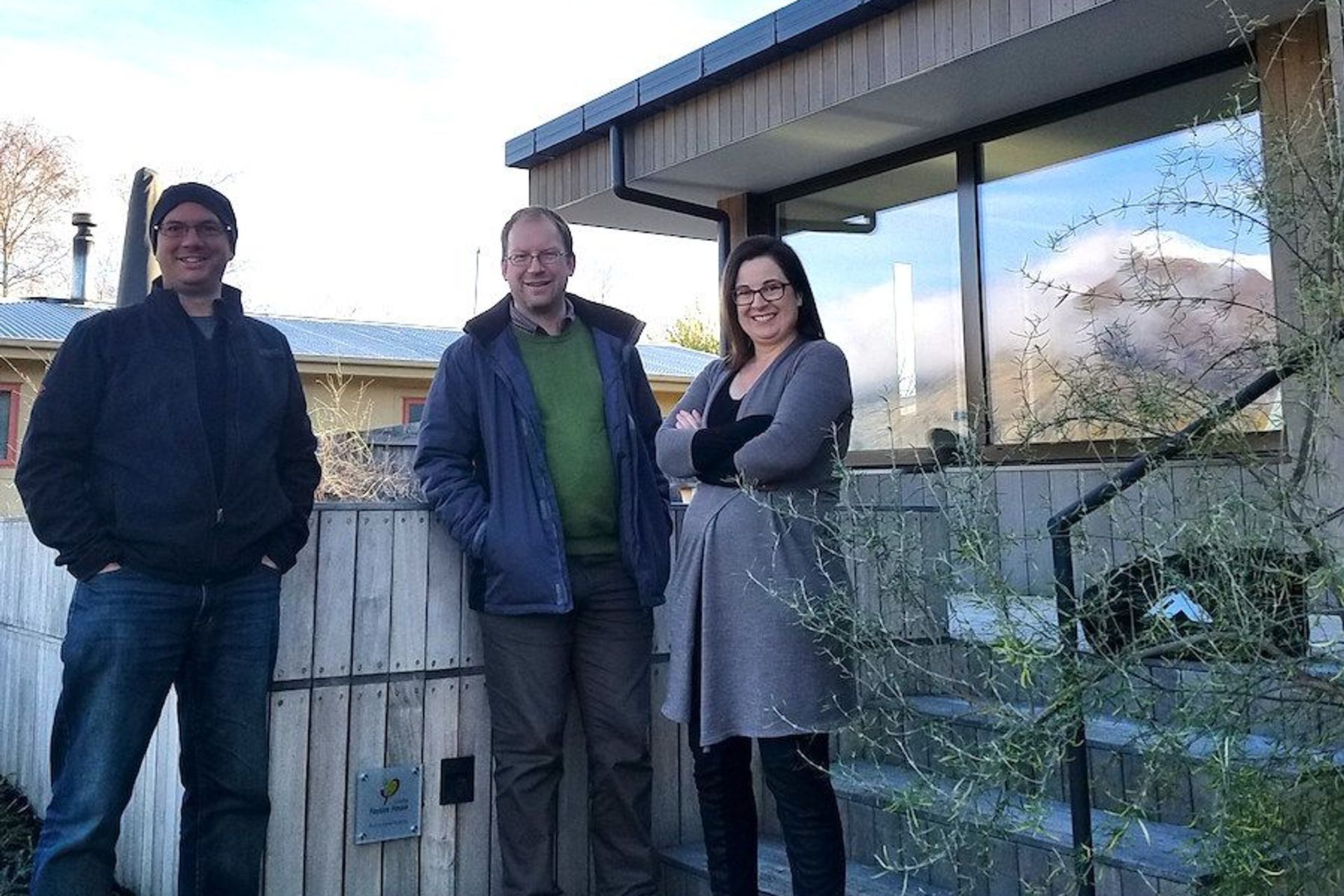 Jason Quinn (far left) in front of certified Passive House in Wanaka (Credit: Sustainable Engineering)