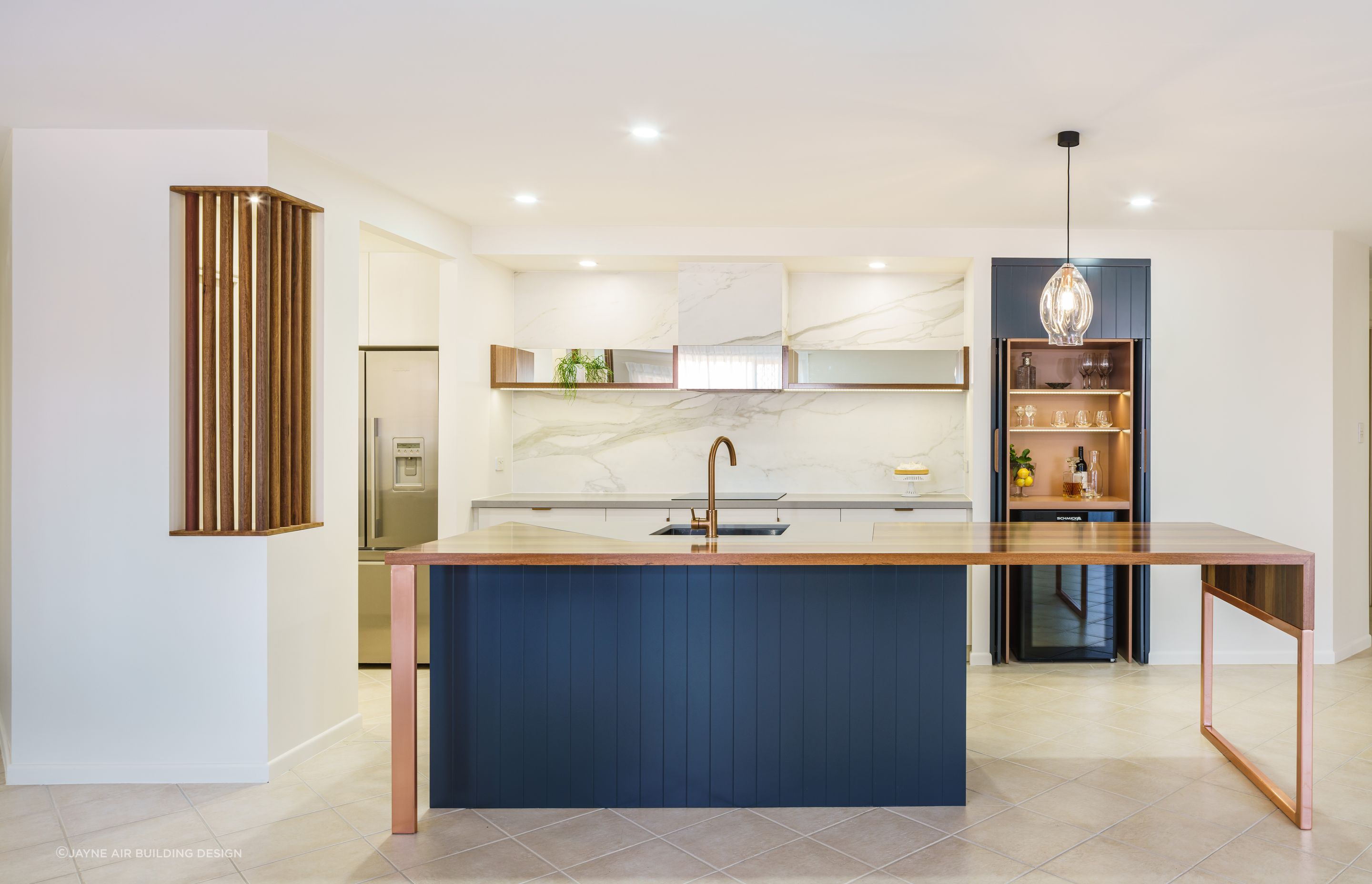 Downlights, pendant lights, cabinet lights - all the bases covered in this kitchen renovation in Underwood - Photography: Photography: Alain Bouvier