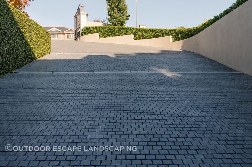 Charcoal Granite Cobblestones | Outdoor Escape Landscaping