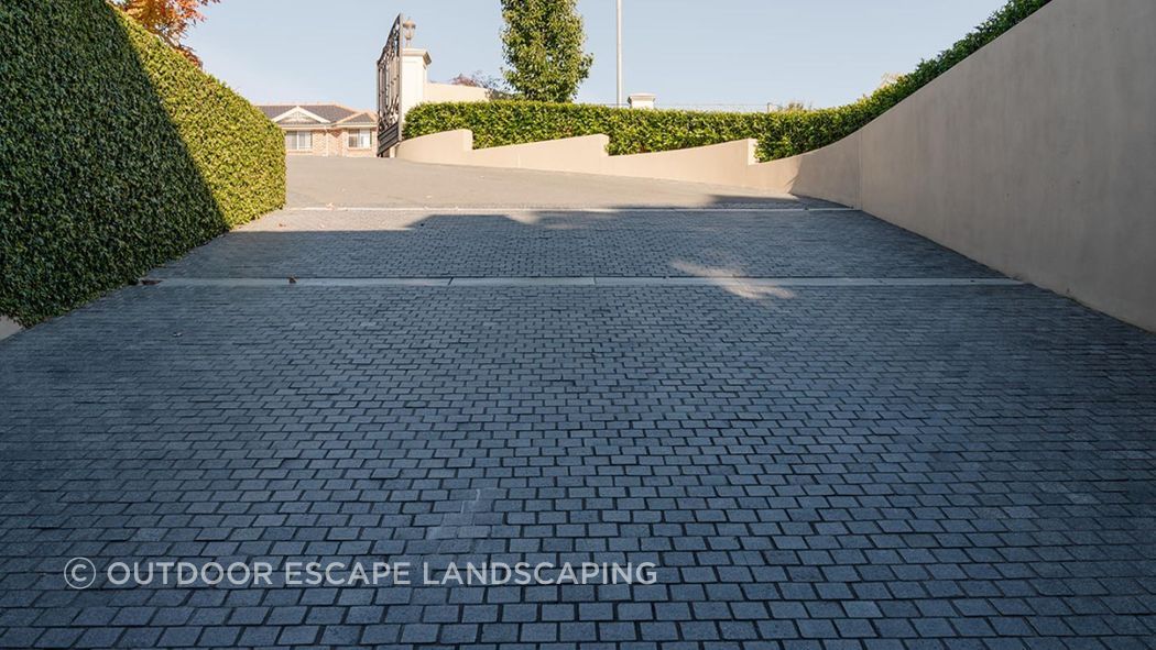 Charcoal Granite Cobblestones | Outdoor Escape Landscaping