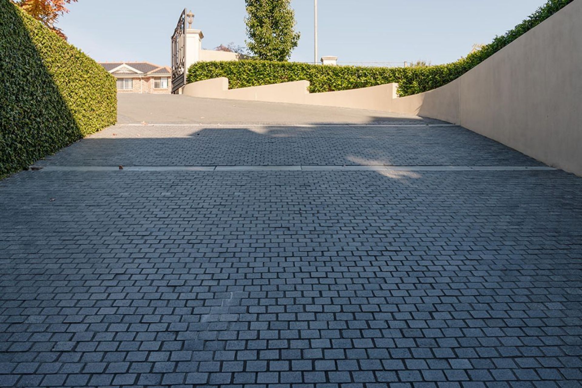 Charcoal Granite Cobblestones | Outdoor Escape Landscaping