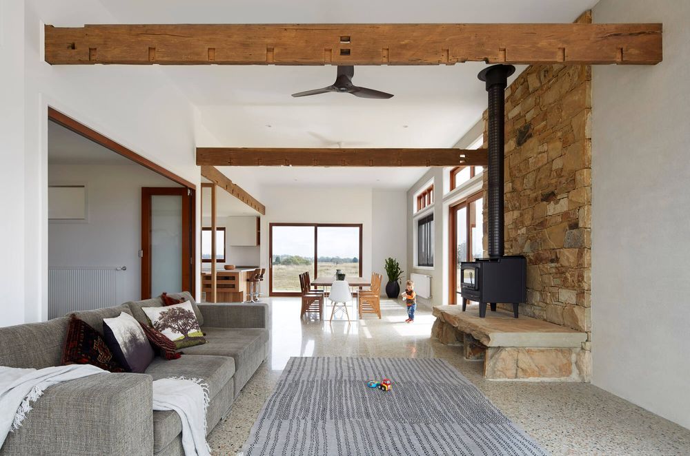 Exposed beams are on display in the living area.