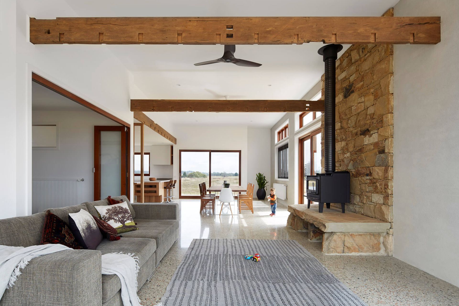 Exposed beams are on display in the living area.