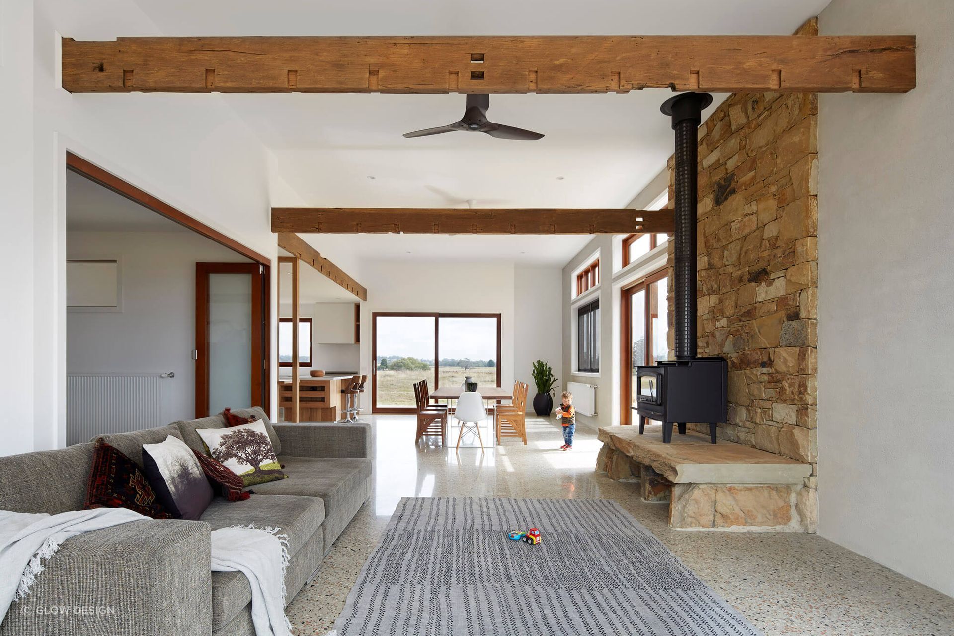 Exposed beams are on display in the living area.