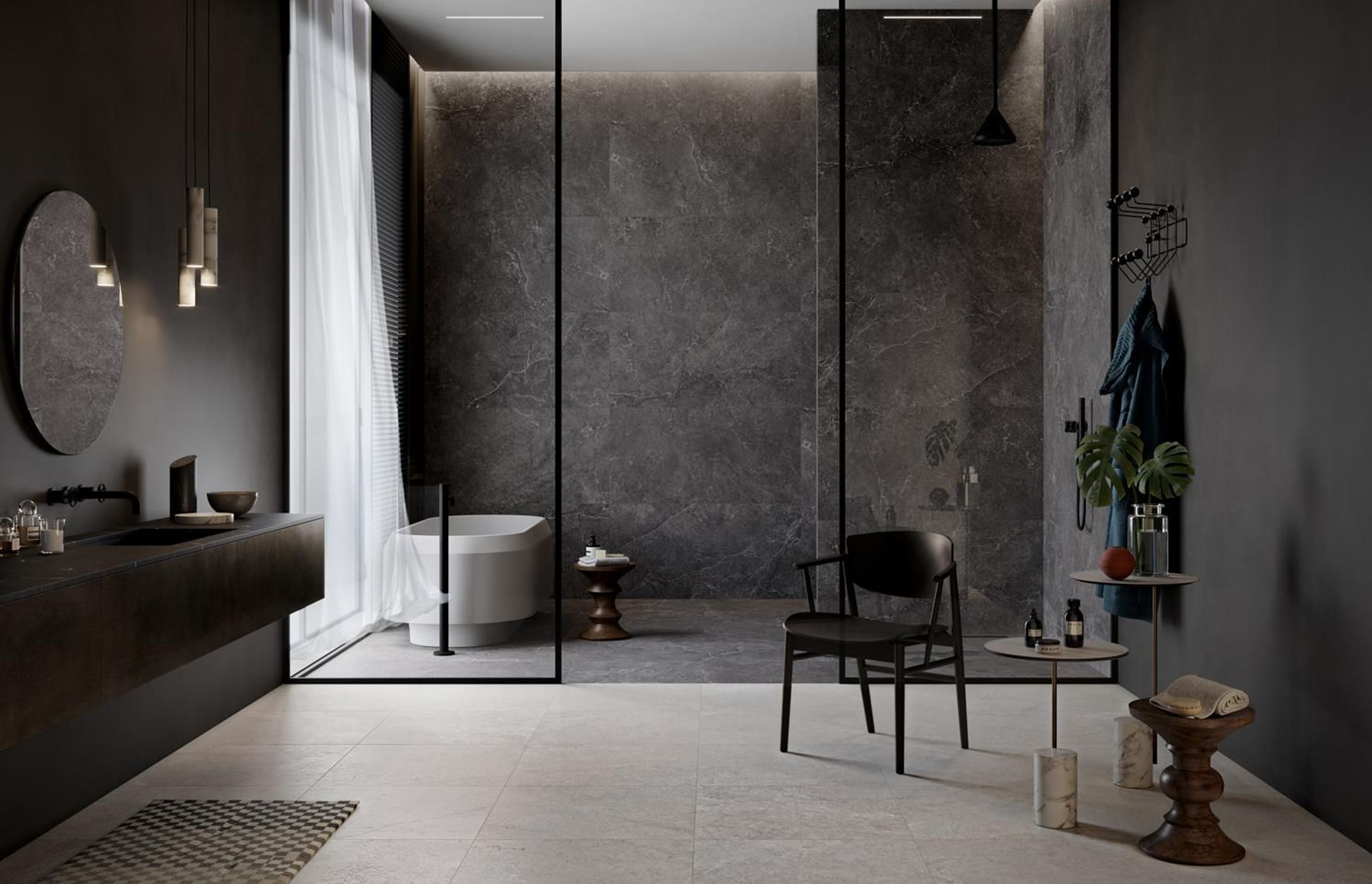 Wall: Carbon Naturale | Shower floor: Carbon Sabbiata | Floor: Stone Sabbiata