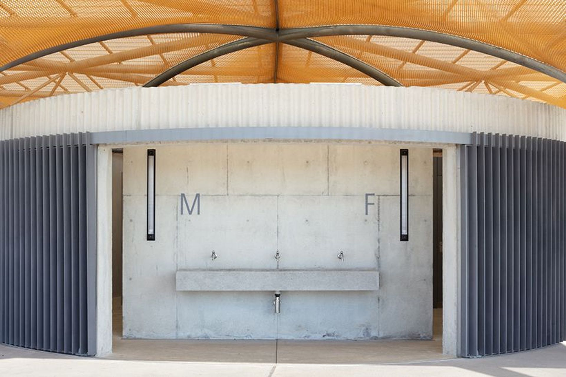 Golden Mesh Shades a Sports Pavilion in Sydney
