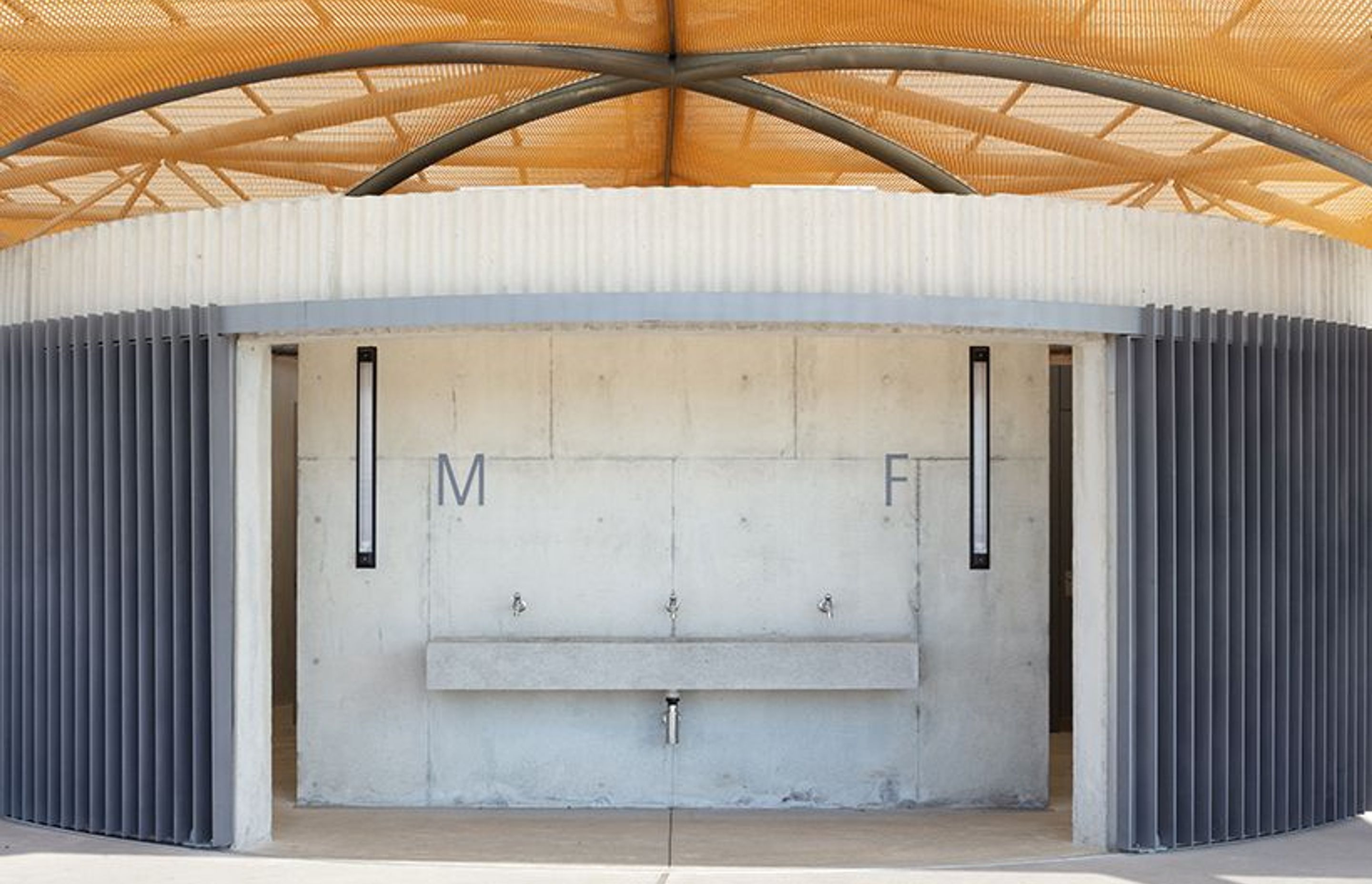 Golden Mesh Shades a Sports Pavilion in Sydney