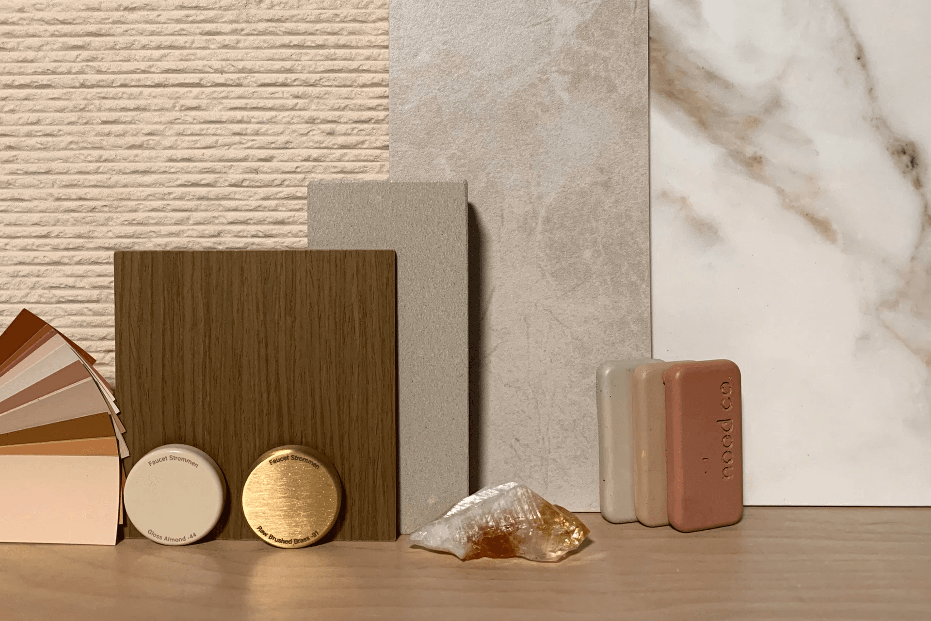 Sustainable finishes - natural paint, Global GreenTag ceramic tiles & timber veneer, recycled glass benchtop surface, Australian-made tap ware & concrete sink samples