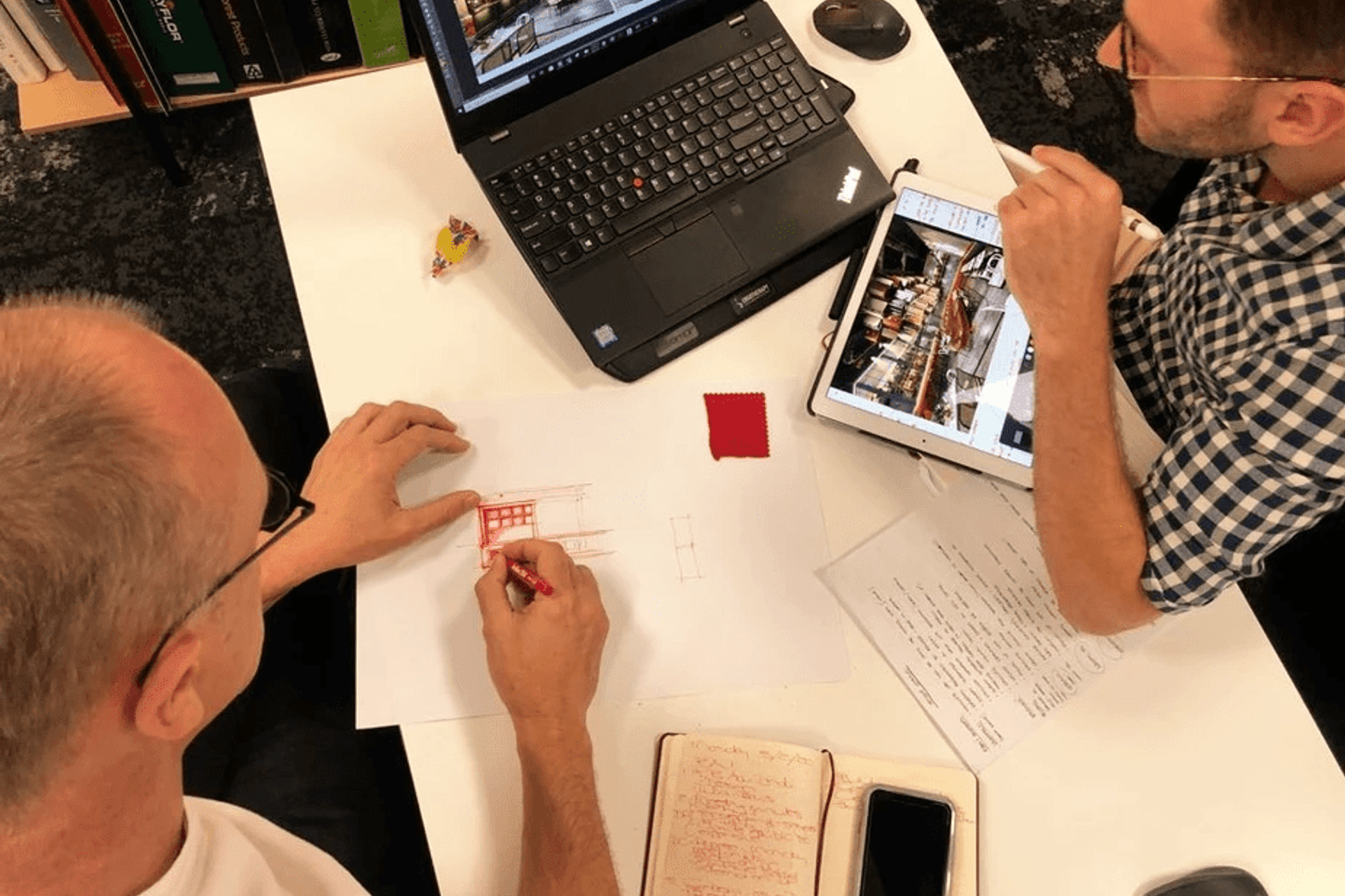 Image: Callie & Calvin in design meeting by Roberto Zambri.