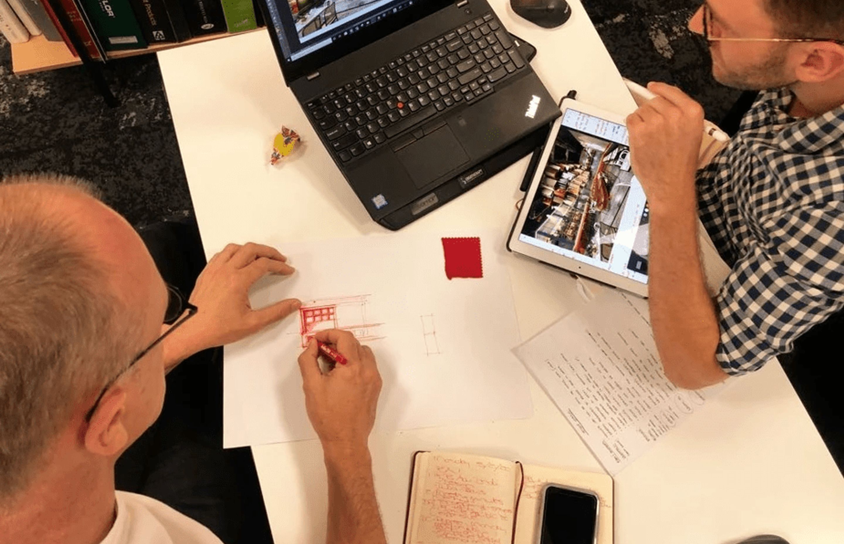 Image: Callie & Calvin in design meeting by Roberto Zambri.